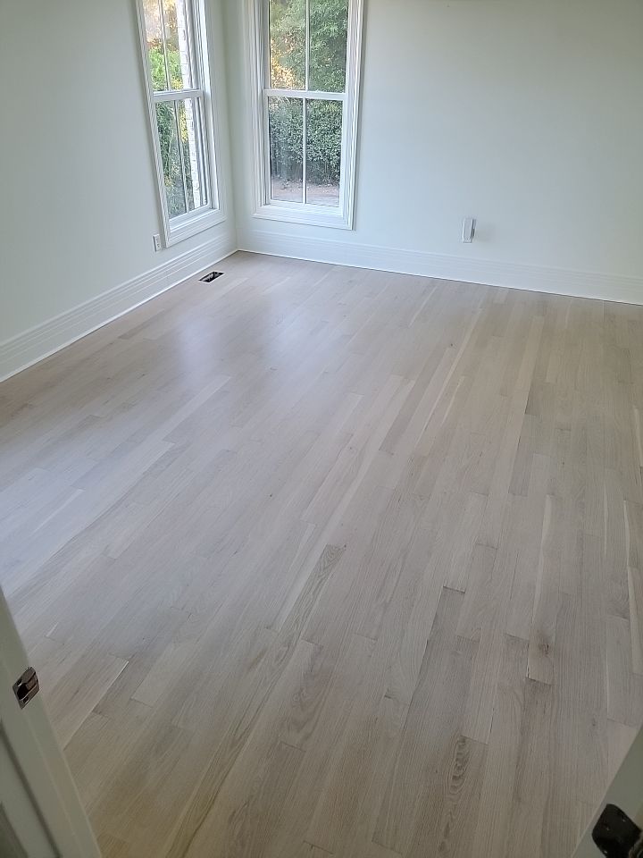 From dark to light, the results are stunning! Beautiful white oak refinish with Country White stain by Footprints Floors of Nashville