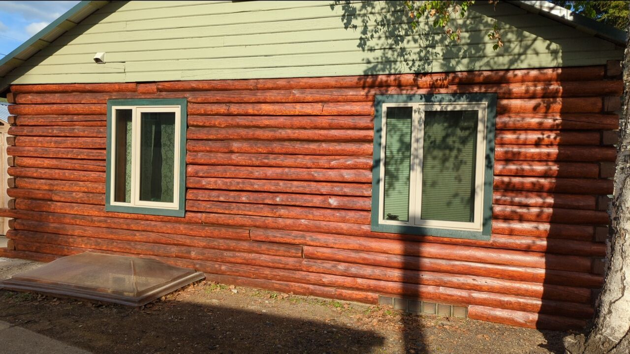 Log Home Exterior Staining by Midnight Sun Painting