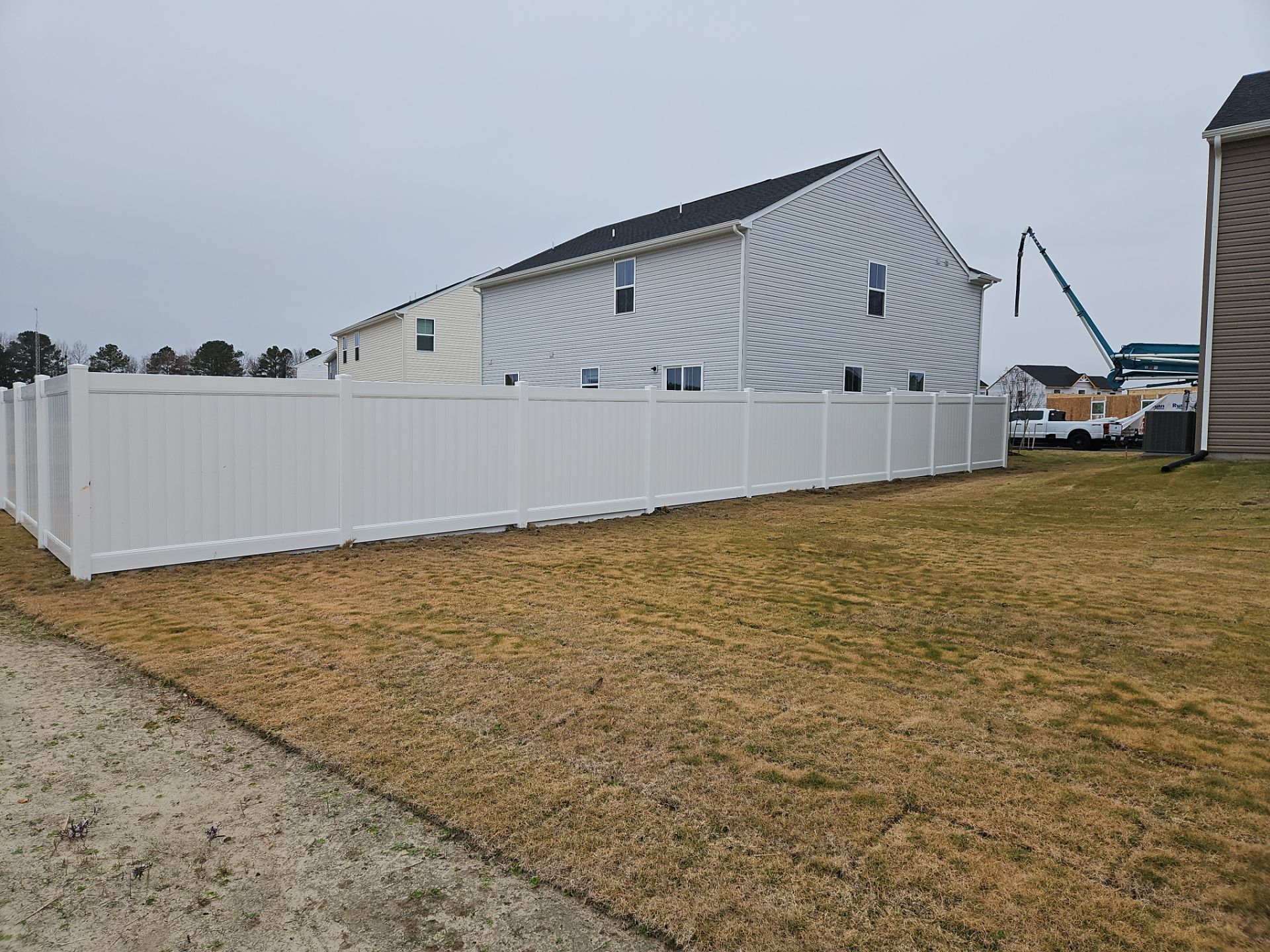 A Perfect Fence for a Brand-New Home by Tidewater Fence