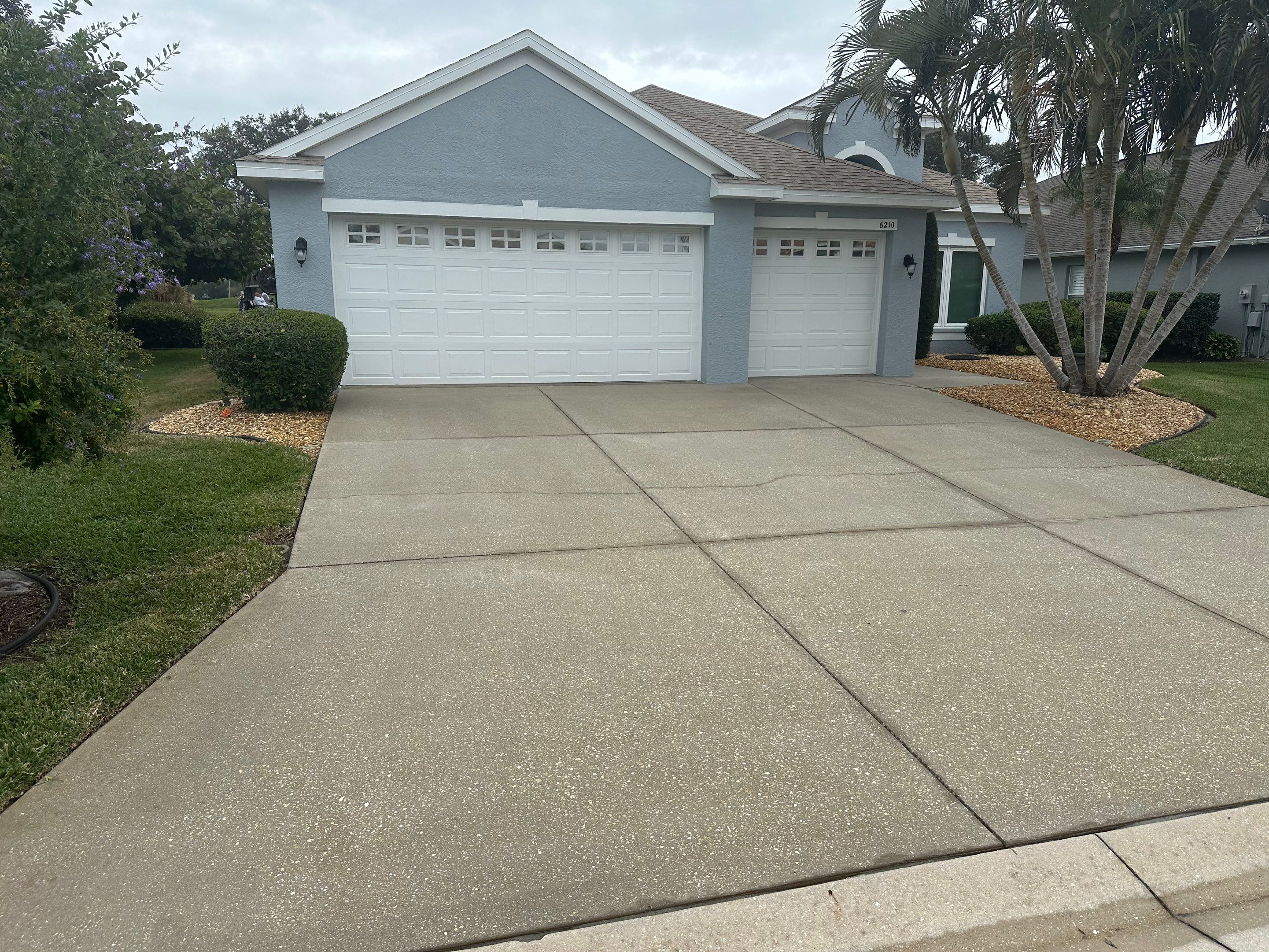 Concrete Driveway, Entryway & Street Curbing Cleaning in Fairways at Imperial Lakes, Palmetto, FL | Sunshine AquaWash by Sunshine AquaWash
