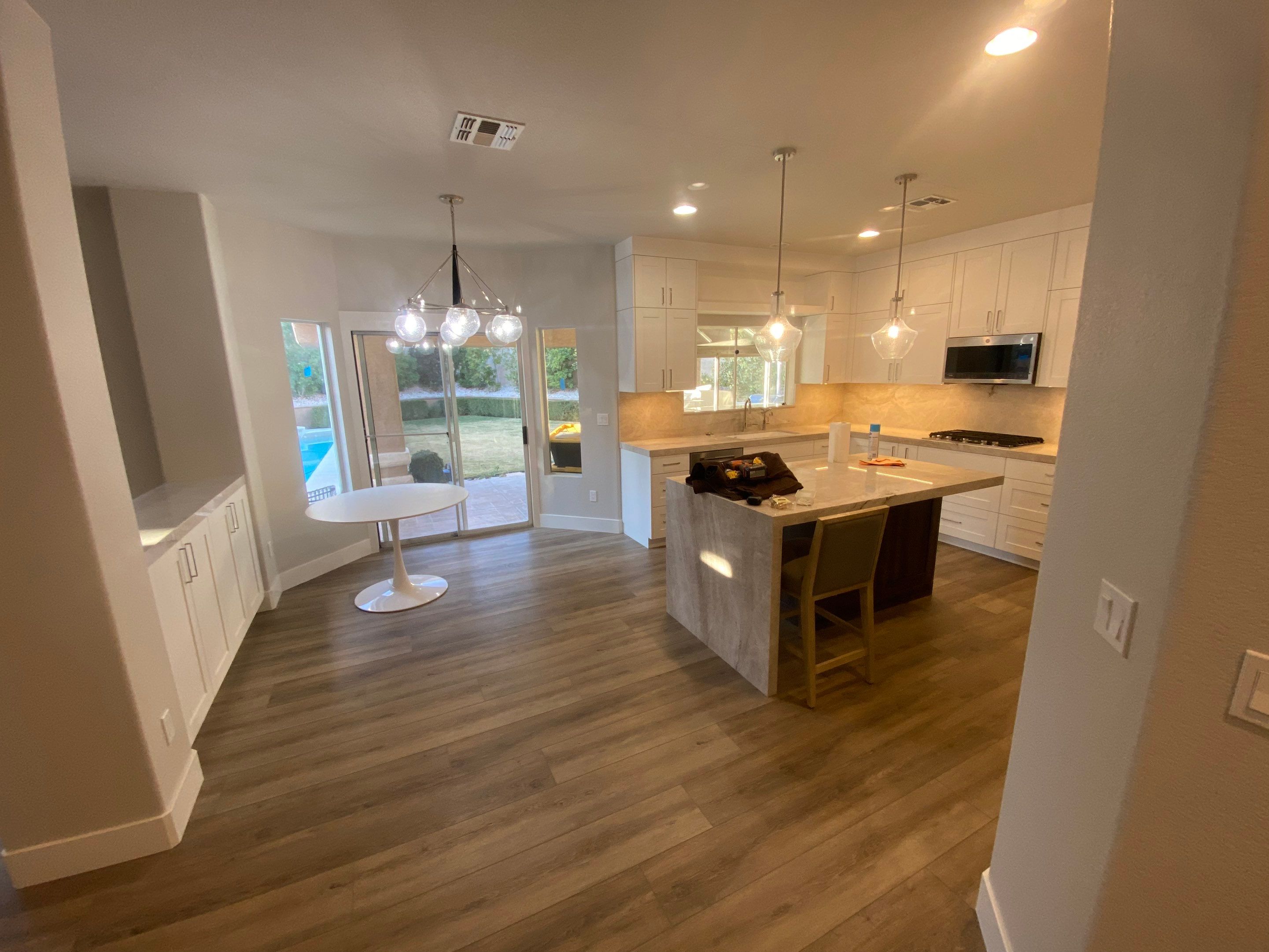Stair refinish & cosmetic remodel  by Level Builders