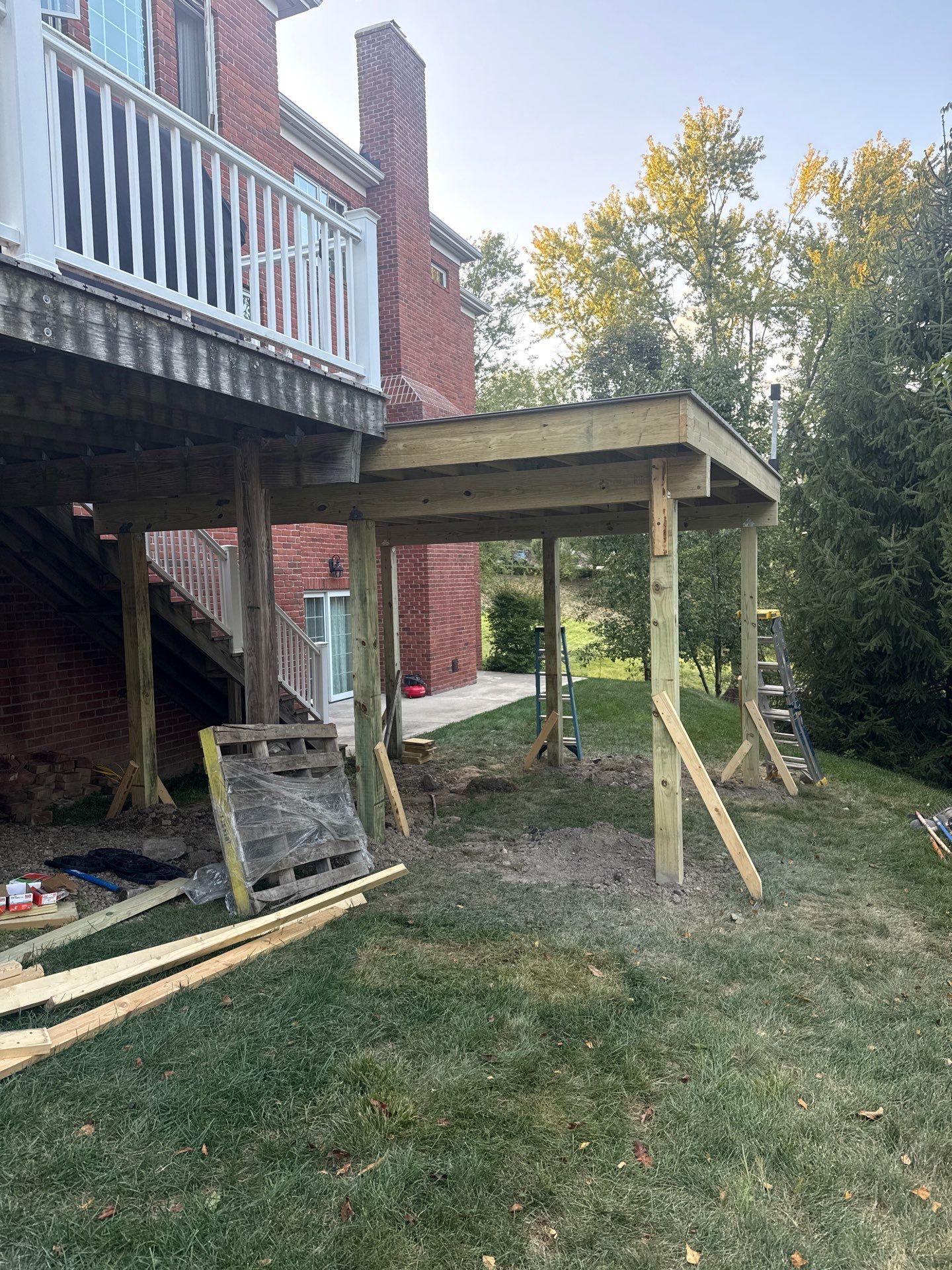 Deck extension  by Cousins Roofing Siding & Decks