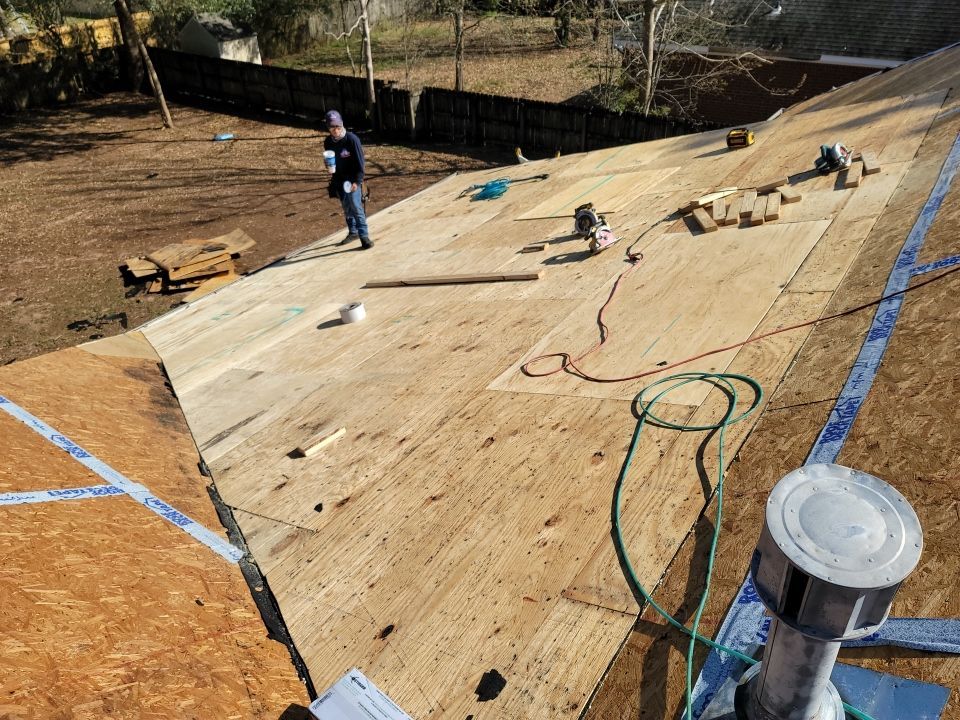 Residential Roofing Installation using Roof Replacement by American Roofing & Construction LLC