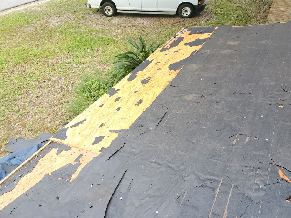Residential Roofing Installation using Roof Replacement by American Roofing & Construction LLC