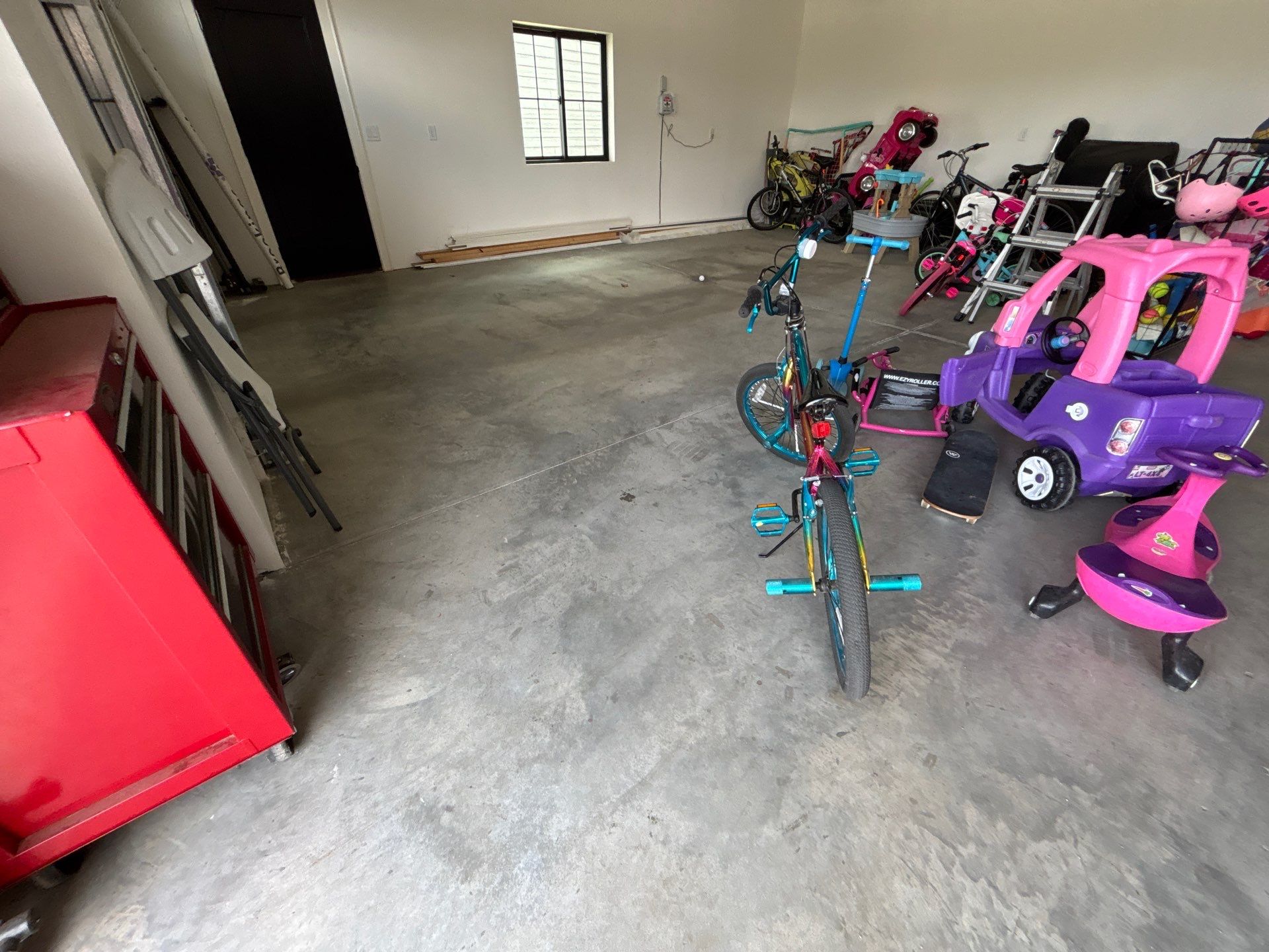 Custom Speckled Concrete Coating for Dell Rapids Garage by Select Painting, Coatings & Garage Cabinets