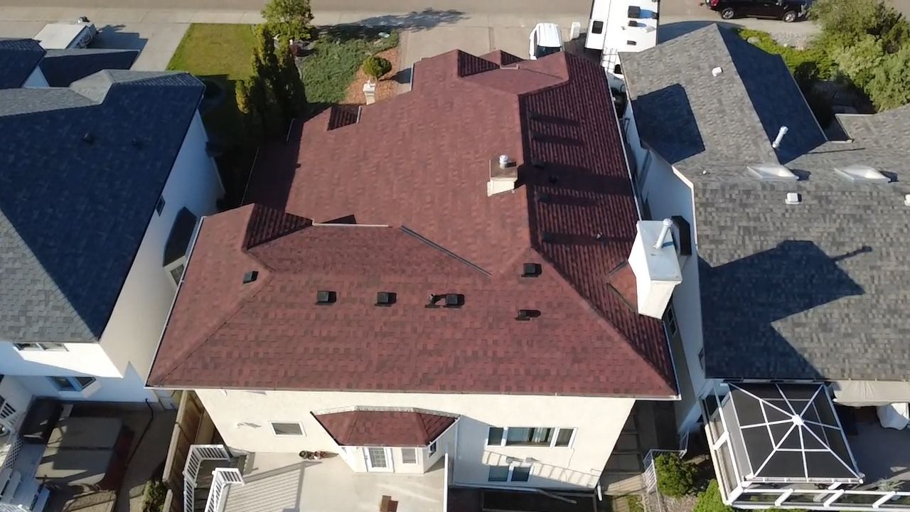 Monaco Red on IKO Dynasty by 2thetop Roofing