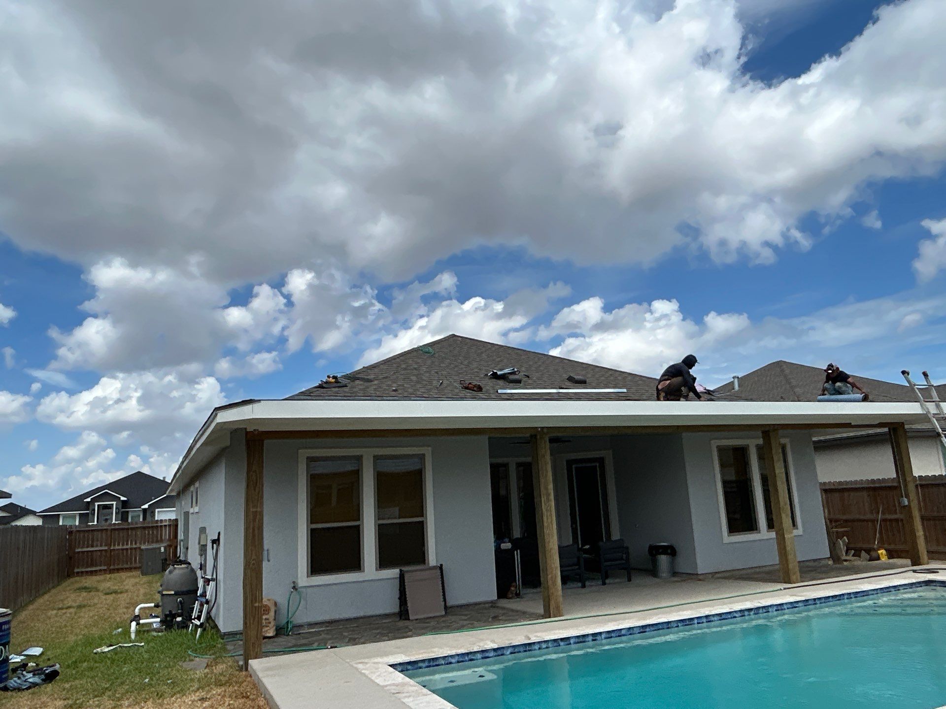 Patio Pool Cover by Bayfront Roofing and Construction