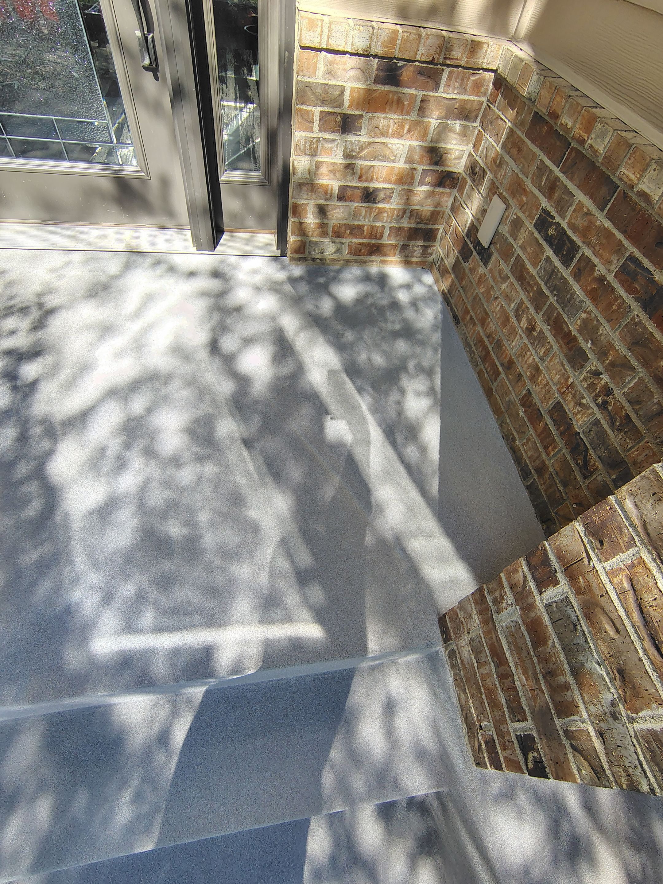 Front Porch Concrete Coating and Restoration in Harrisburg by Select Painting, Coatings & Garage Cabinets