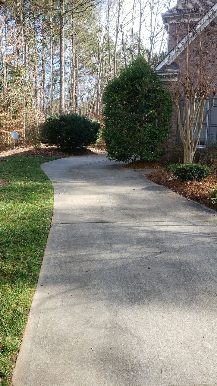 Driveway Clean using cleaner by Power Wash Masters LLC