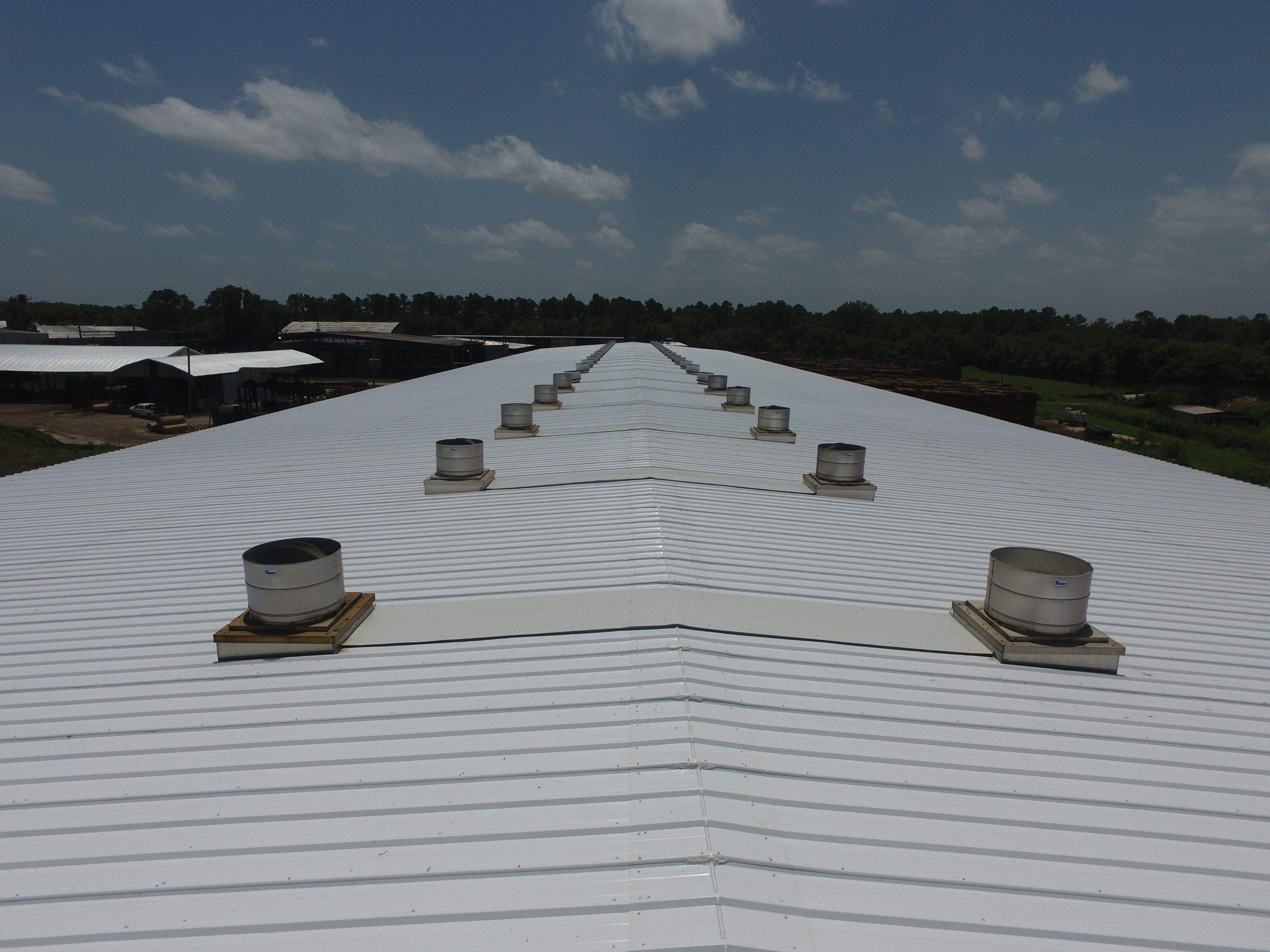Commercial Roofing Installation using Aluminum Roofing panels by Hostetler Roofing