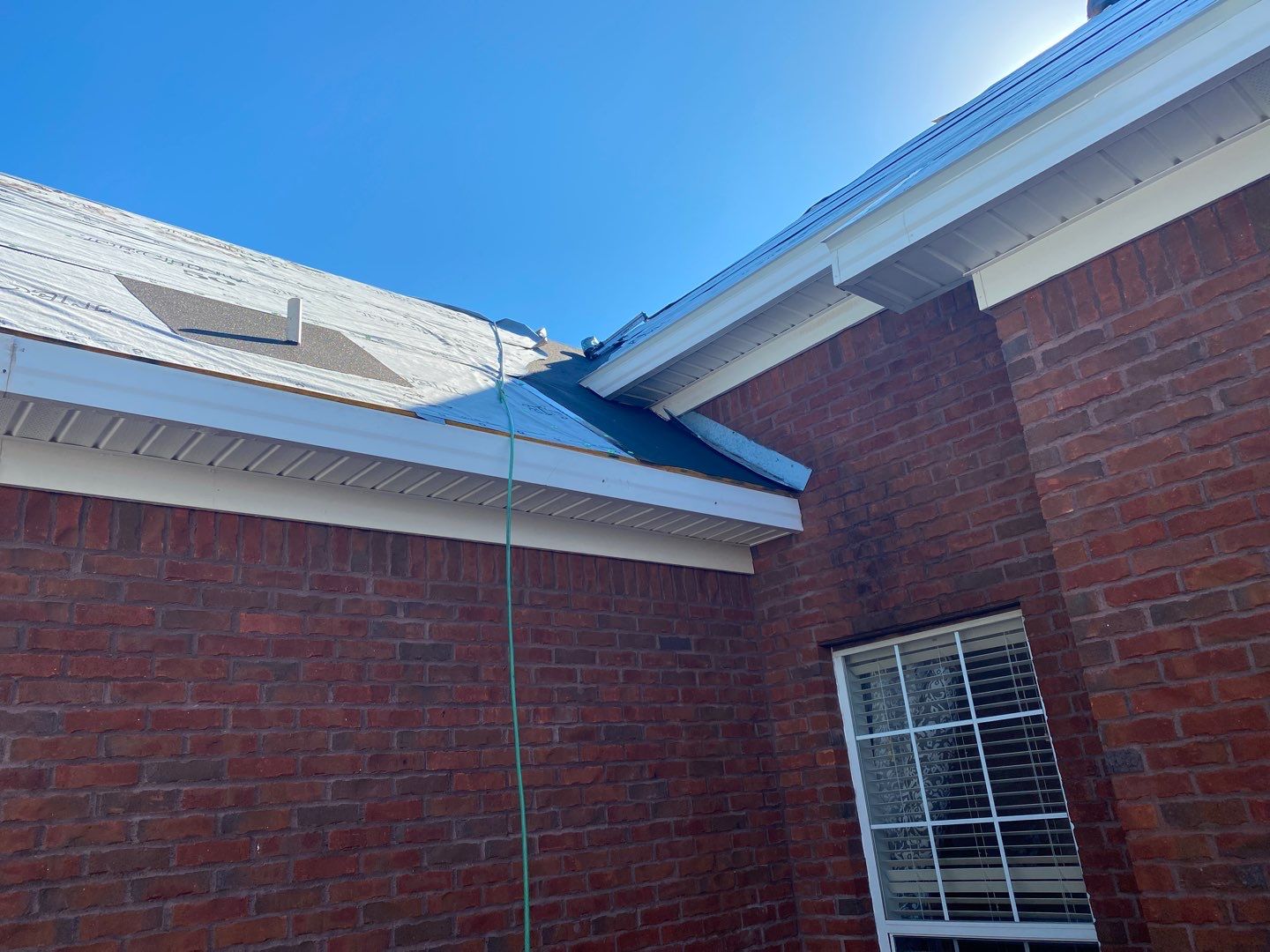 Residential Roofing Installation using Roof Replacement by American Roofing & Construction LLC