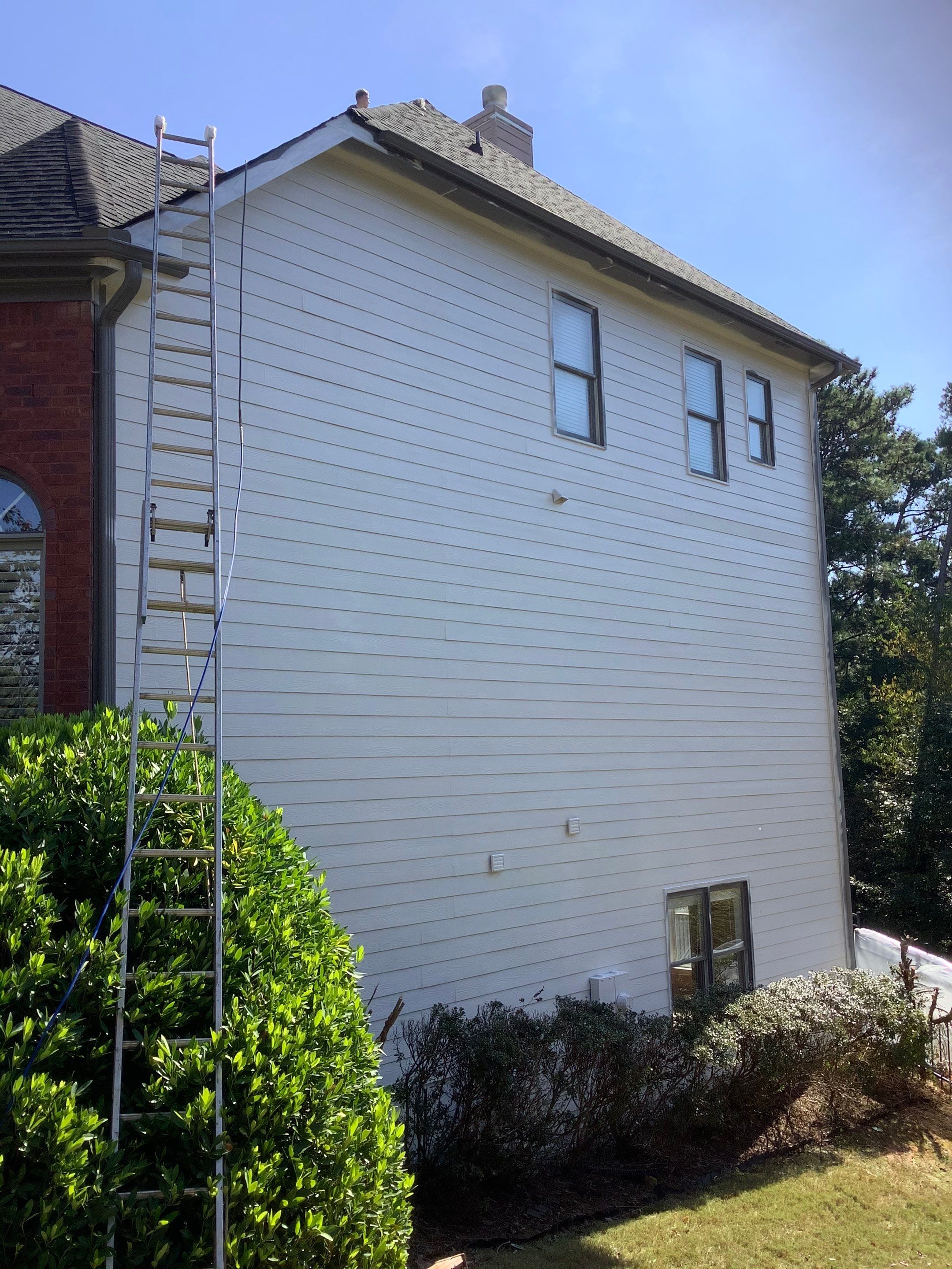 Exterior House Painting and Siding Refresh in Suwanee by Swift Home Renovations