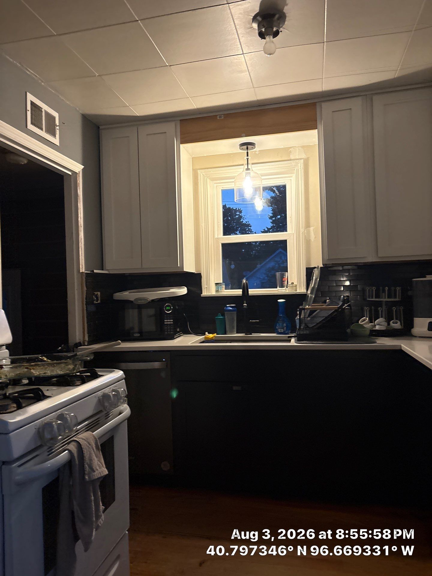 Lincoln Kitchen Remodel with Two-Tone Cabinetry and Quartz Counters by CompanyCam Sales Demo