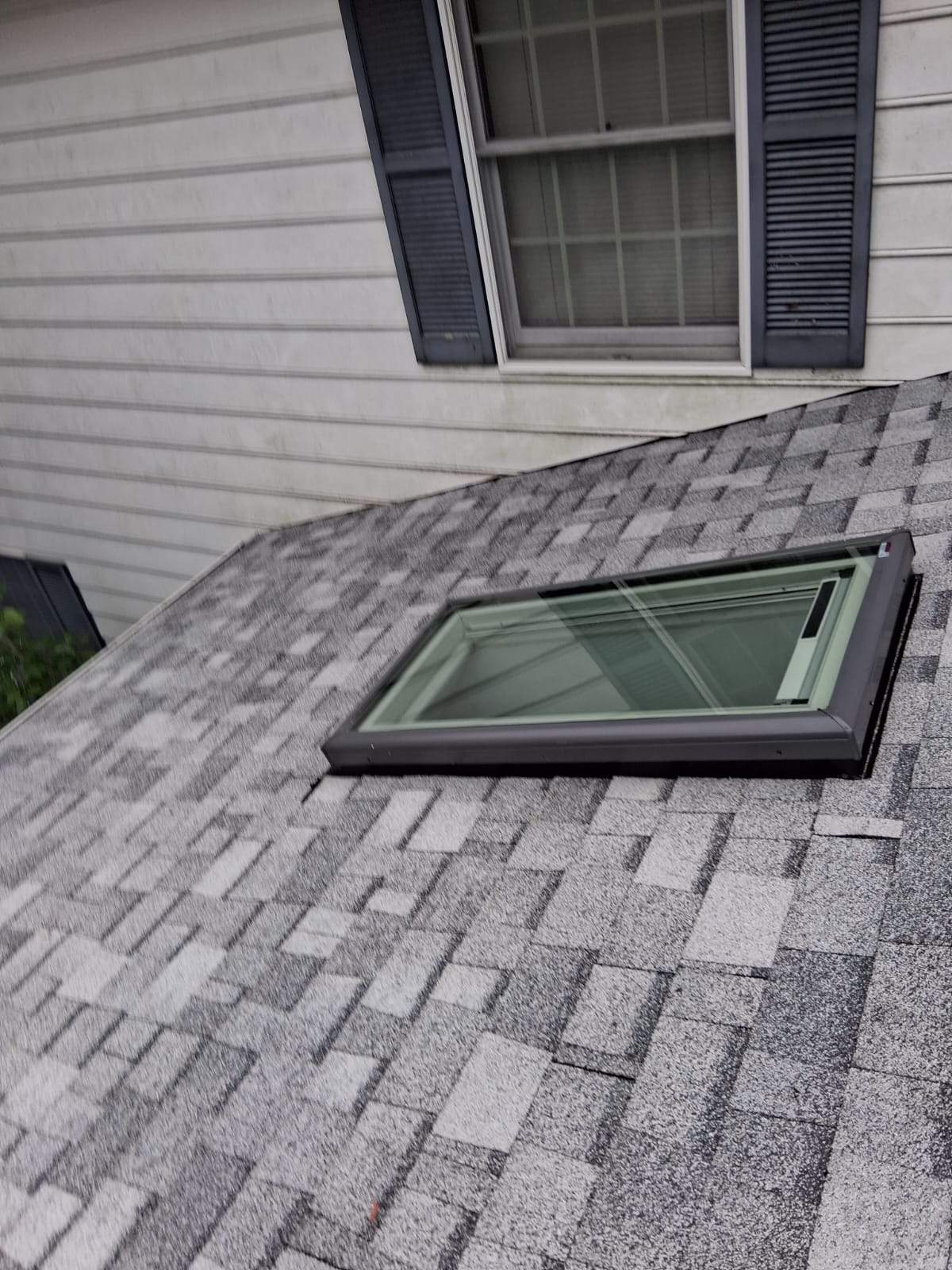 Roof Replacement with Skylight Installation in Frederick, MD by ARCH Exteriors 