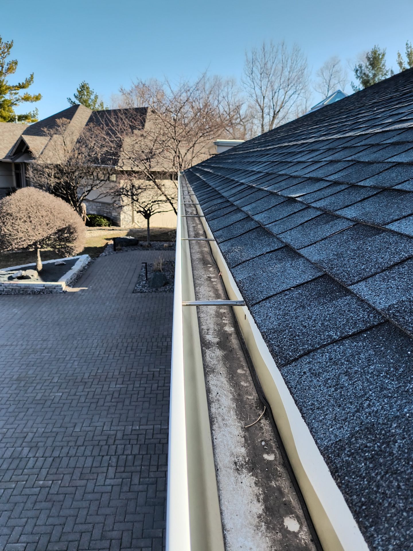 Gutter Cleaning Done Right by Next Level Seamless Gutters / Exteriors Inc.