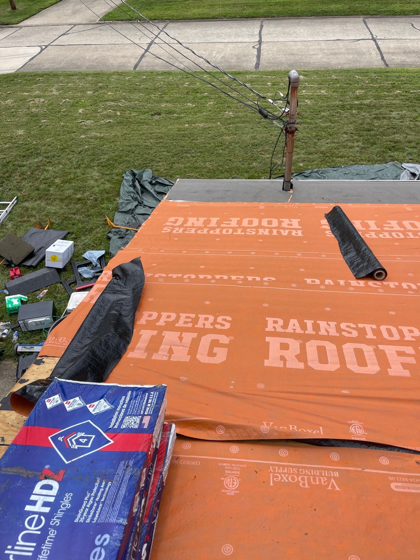 Residential Roofing Installation using GAF Timberline HDZ Oyster Grey by Rainstoppers Roofing