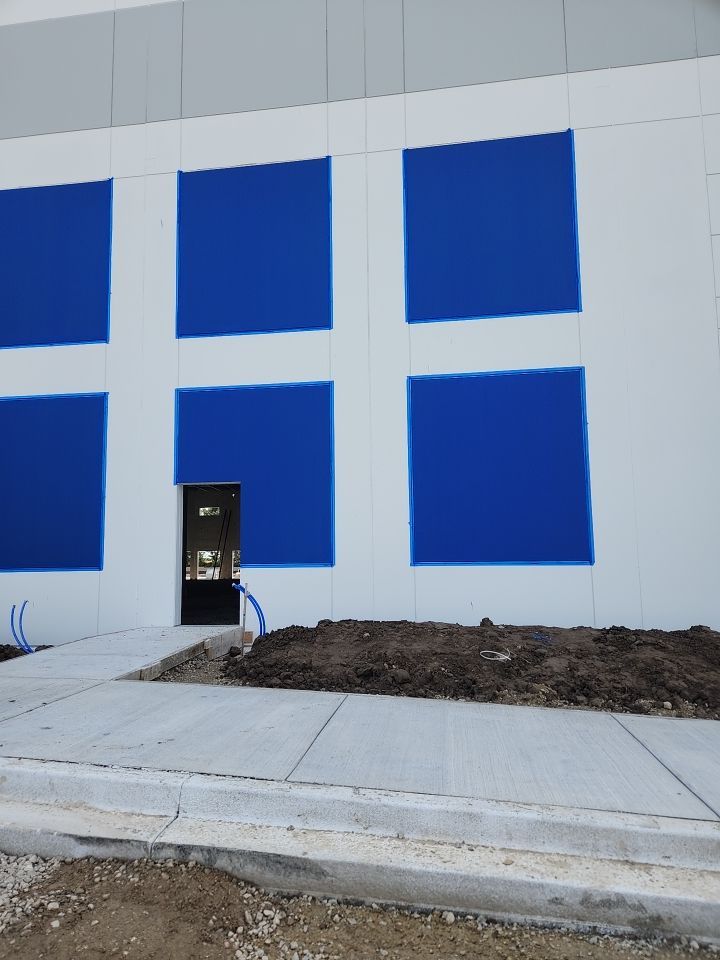Warehouse Construction using Hallman Lindsay Vertical Concrete Stain 167 by Blair Commercial Painting, LLC