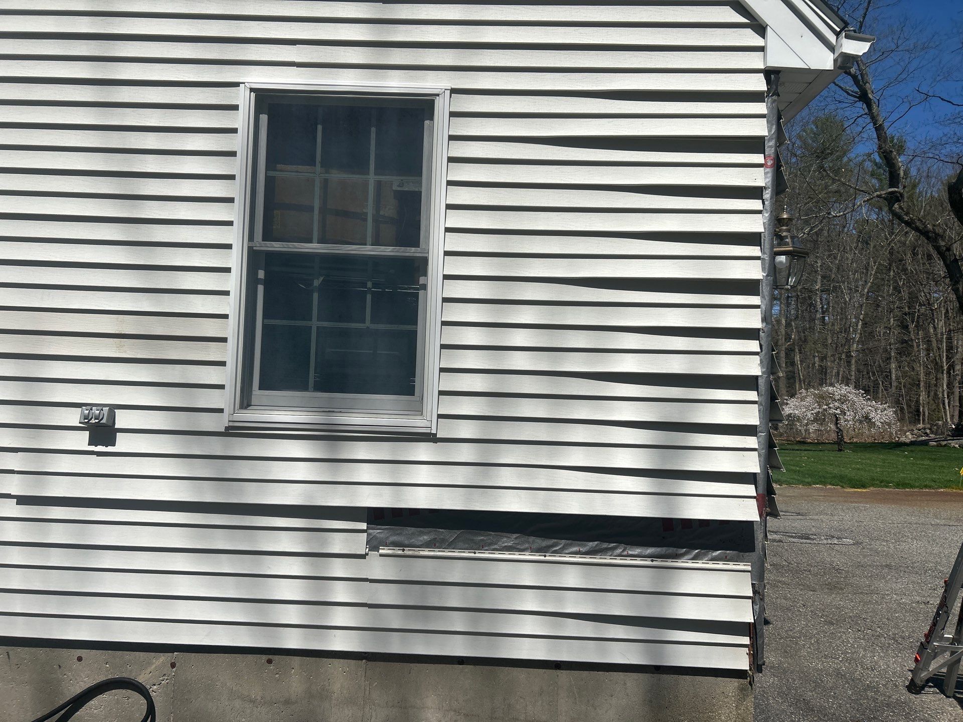 Vinyl Siding Repair with Spot Replacement by Mighty Dog Roofing of Greater Middlesex County