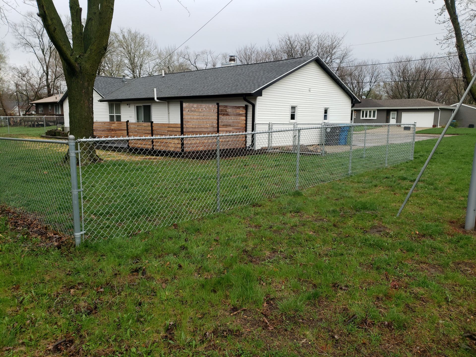Galvanized Chain Link and Horizontal Wood Privacy Fencing in Waterloo by Perfect Picket Fence and Stain