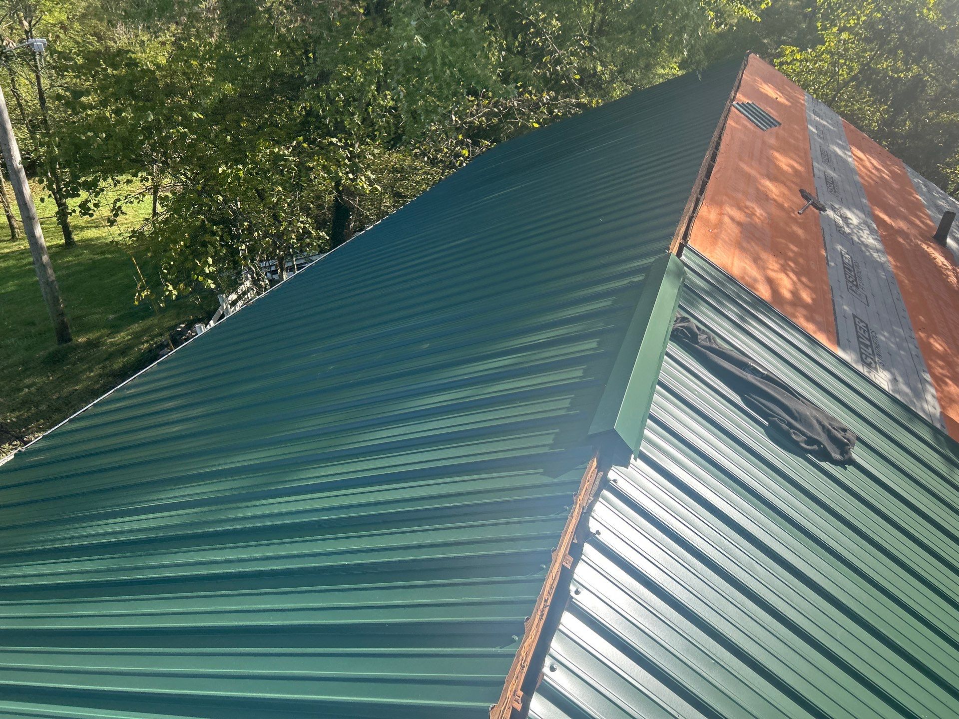 Residential Roofing Installation using Metal by Rainstoppers Roofing