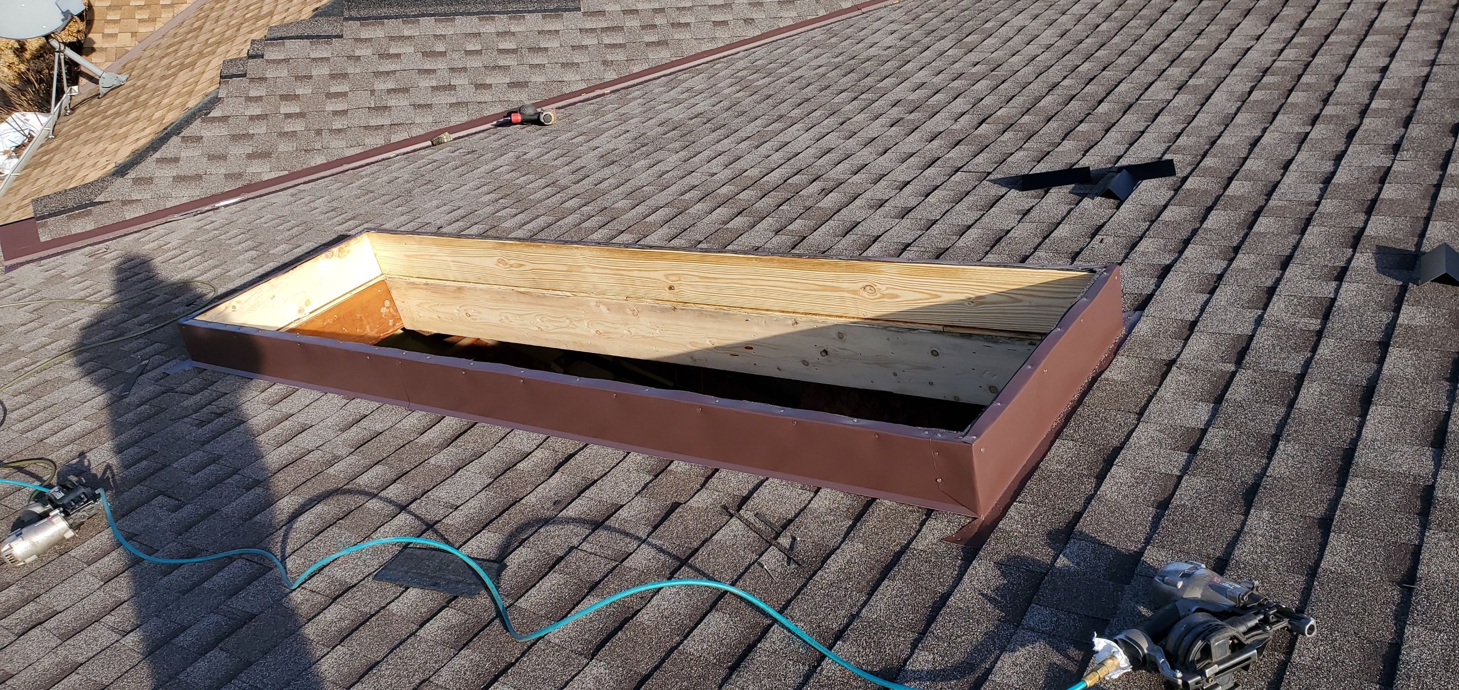 Skylight removal and install  by Absolute Roofing and Construction