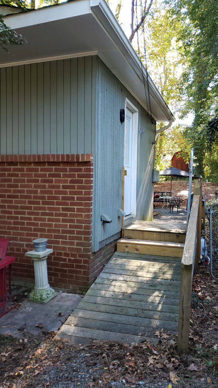 House Wash using cleaner by Power Wash Masters LLC