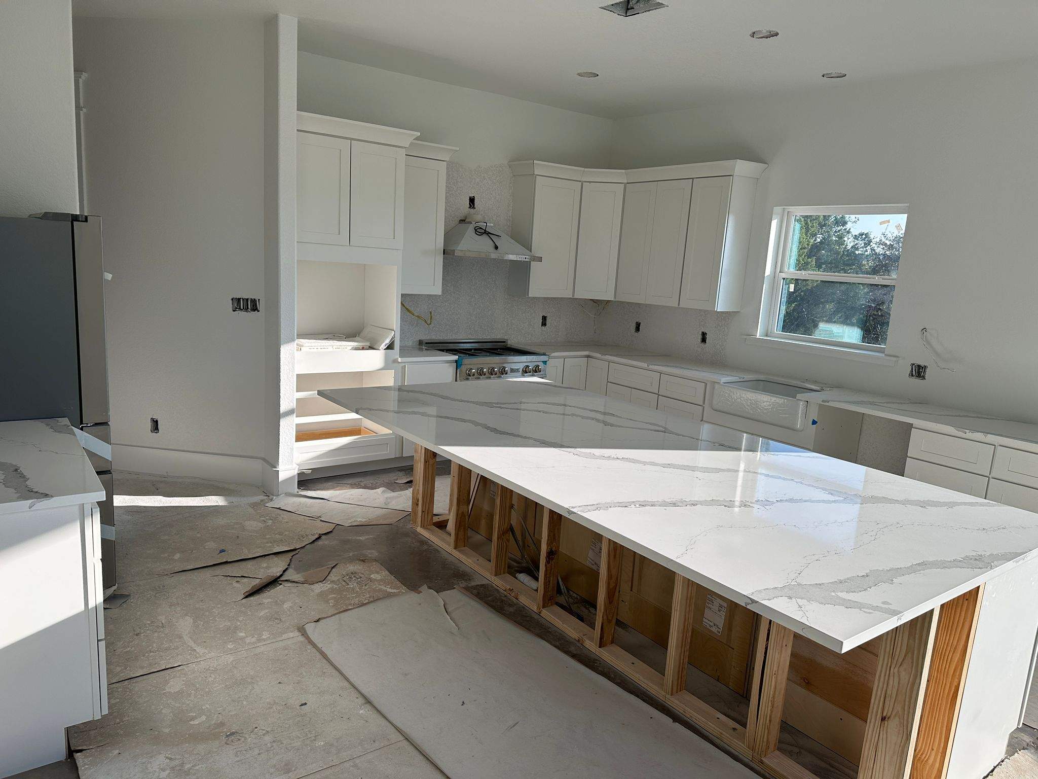 Kitchen and Bathroom Countertop Upgrades Featuring Gray Veined Quartz by Mena stone surfaces