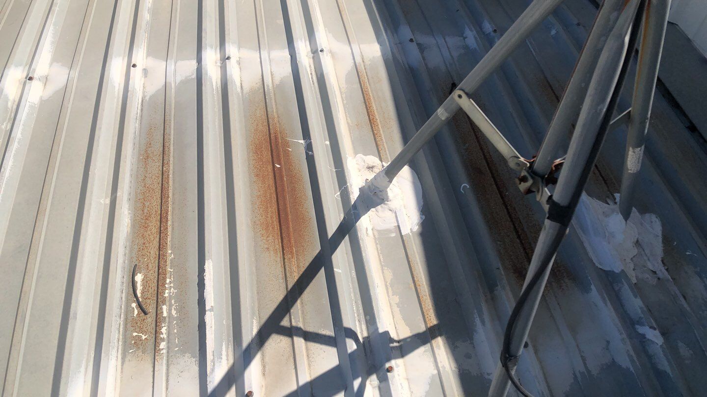 Metal Restoration Roofing system with Benchmark/PUMA XL 20 yr warranty by Straight Edge Roofing Inc