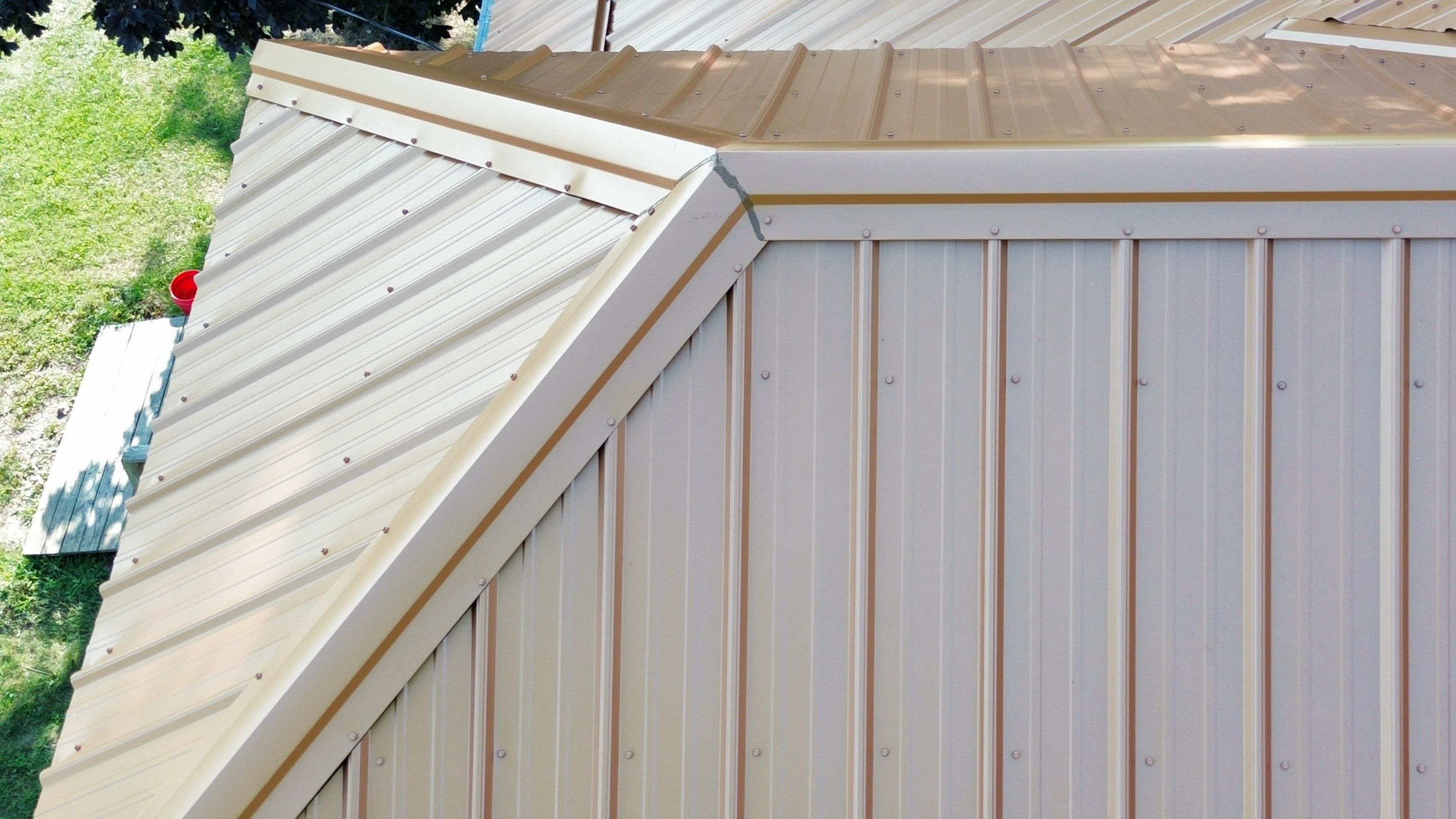 Residential Roofing Installation using Performance Panel Metal - Copper Metallic by RoofX 