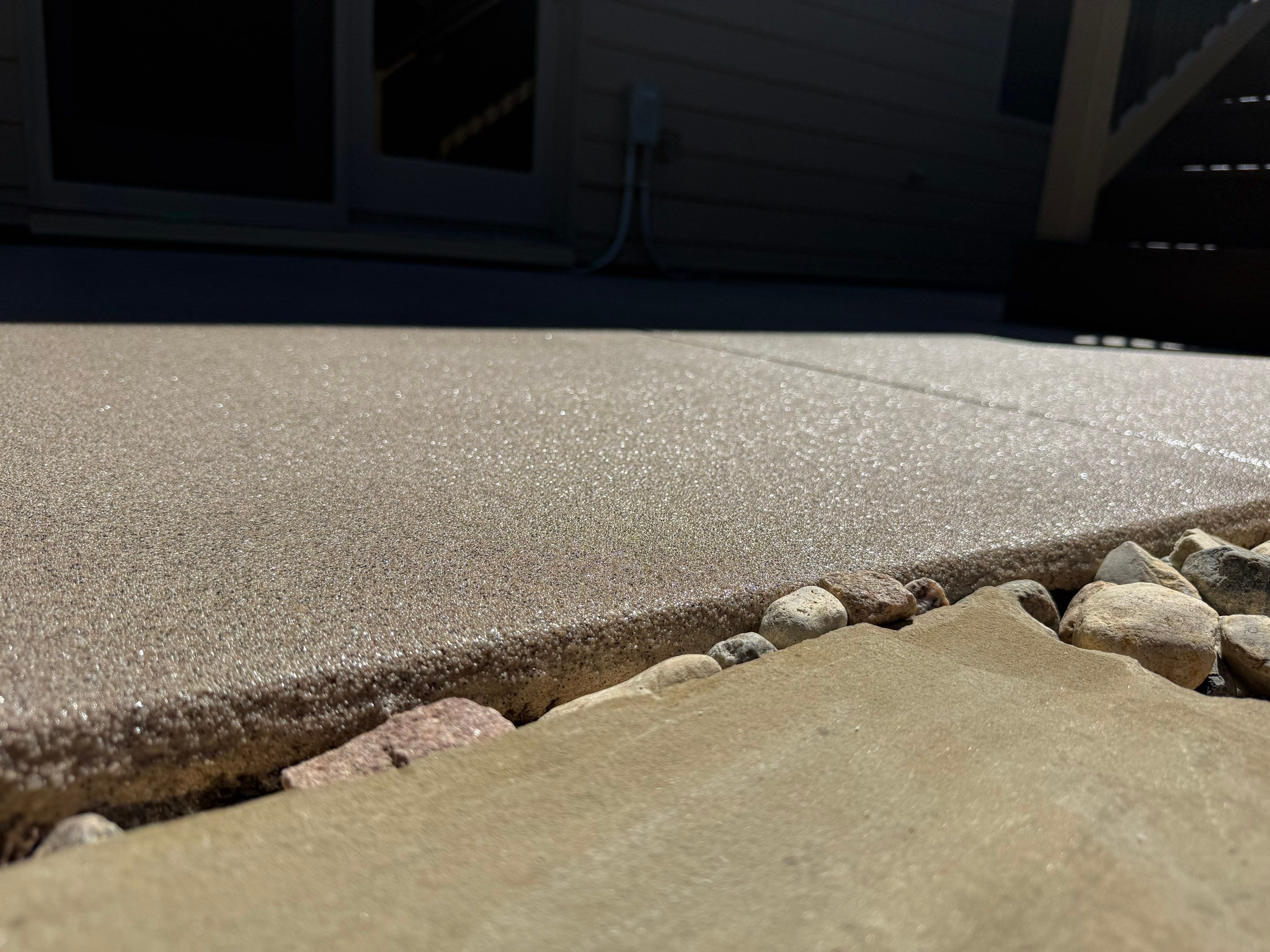 Textured Concrete Coating and Paver Patio Refresh in Sioux Falls by Select Painting, Coatings & Garage Cabinets