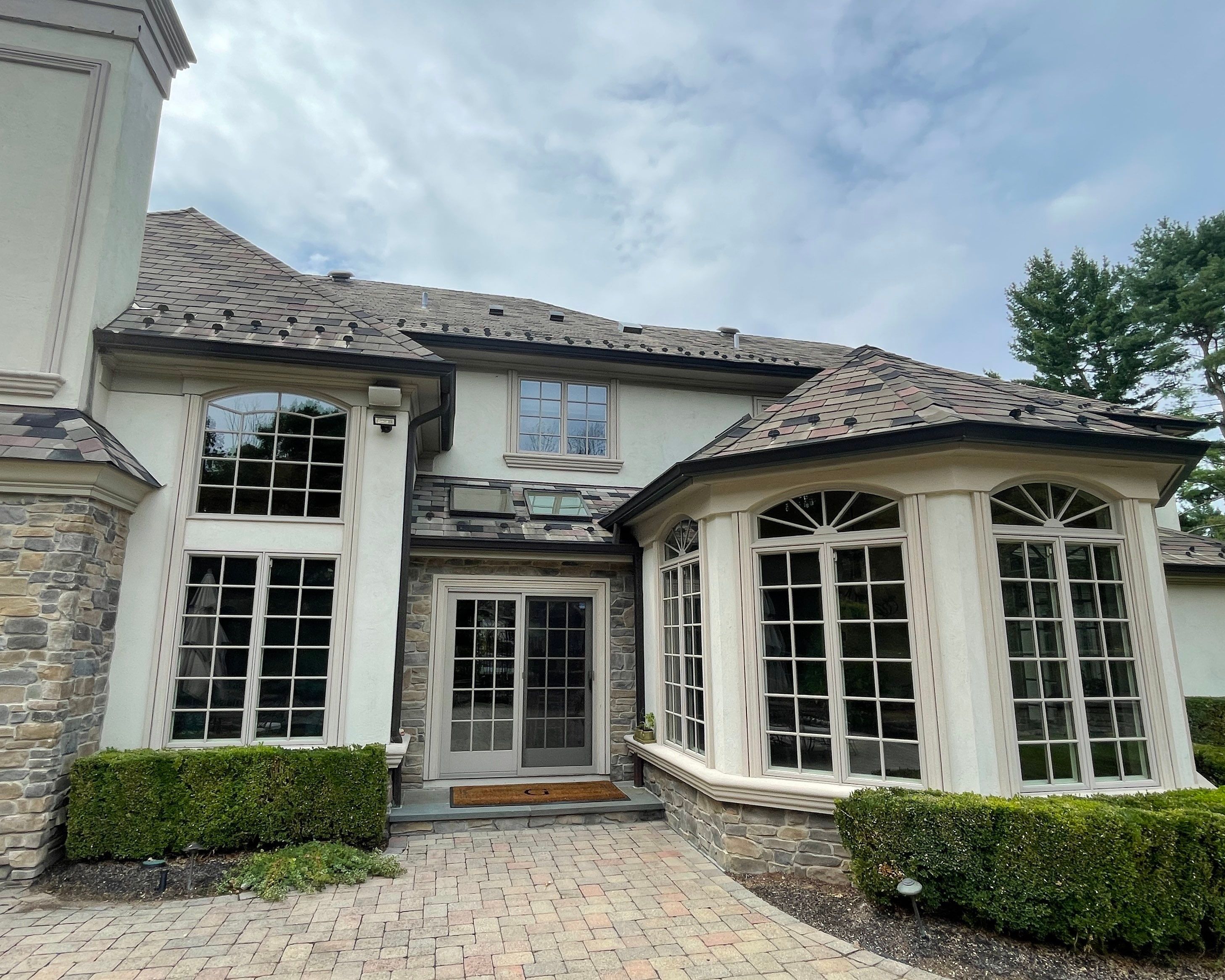 Full Slate - Stucco - Copper Remodel by USA Roof Masters