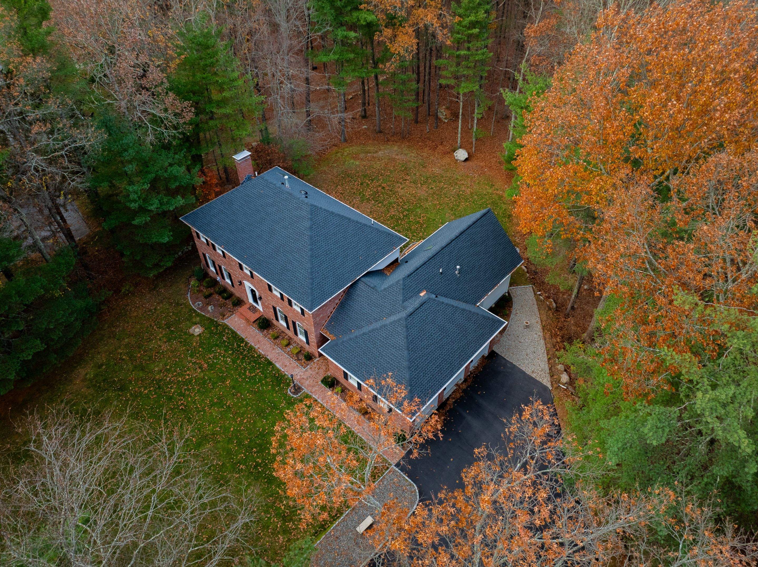 High Hawk - Architectural Shingles, Copper Brick Flashing, Skylights by Rinaldi Brothers