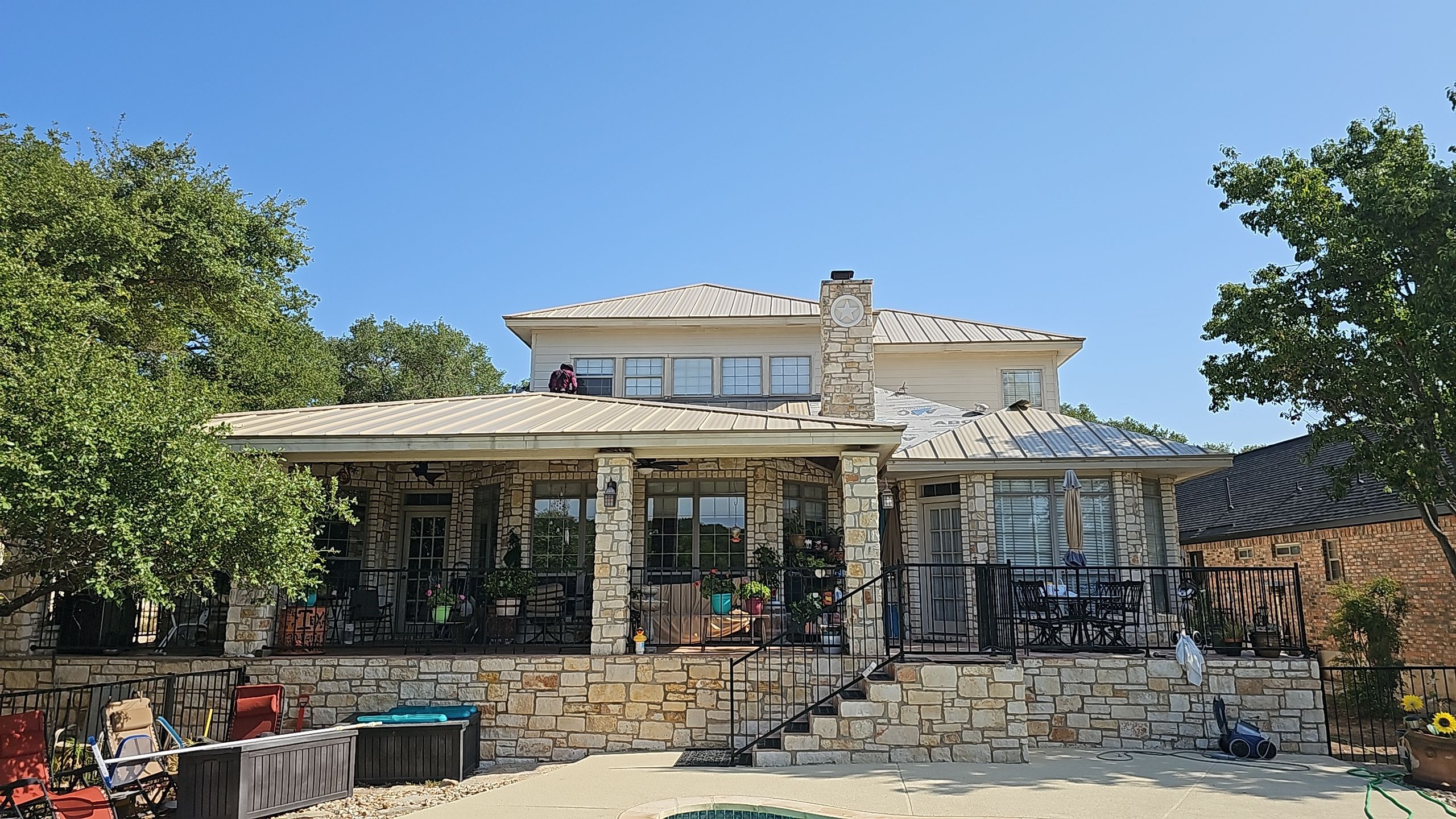 Residential Roof Replacement using 24 GA Double-Lock - Surrey Beige by Action Exteriors Austin