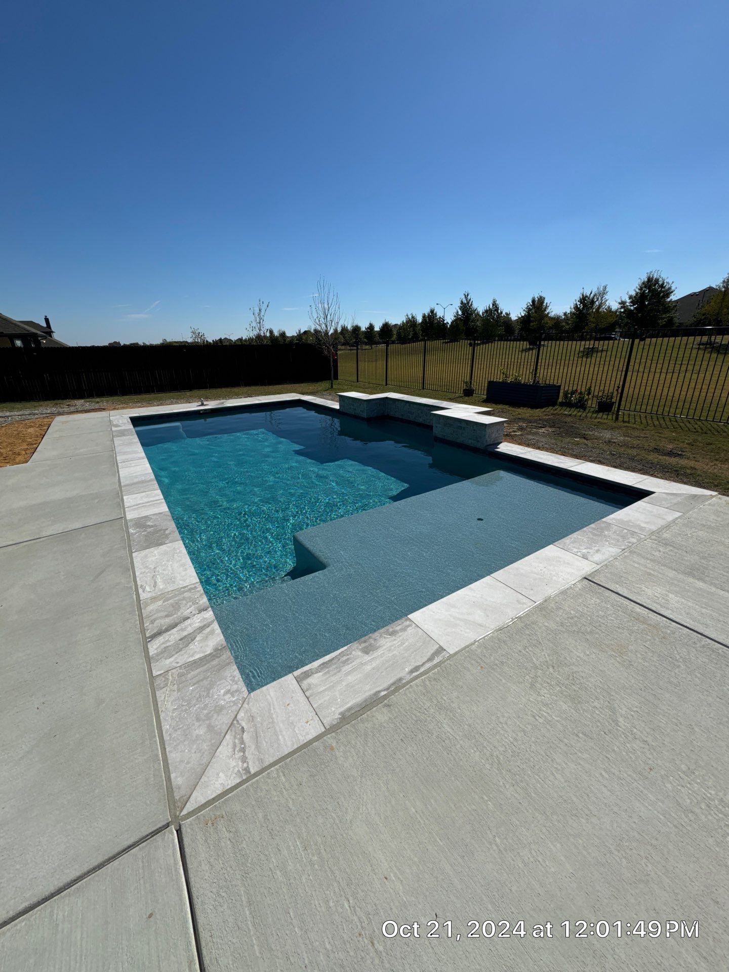 Modern Geometric Pool with Expansive Deck by Pinnacle Pools and Spas - DFW