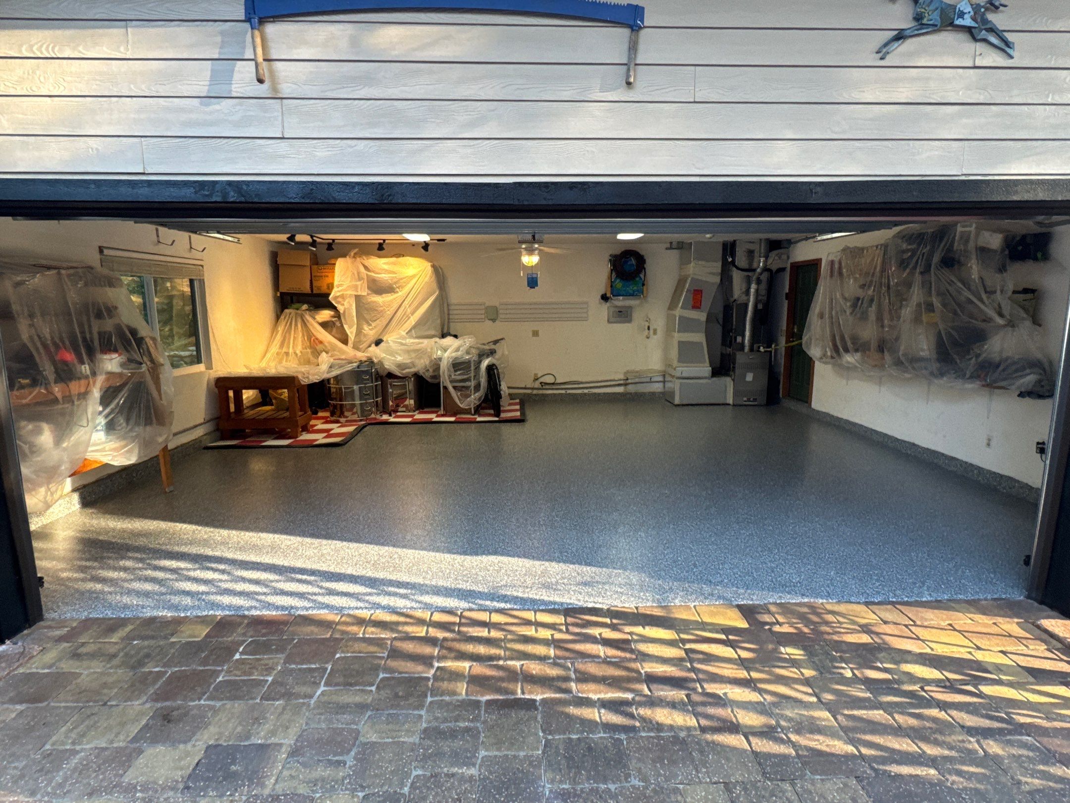 Garage in Gainesville, FL in Smoke by Cross Creek Concrete Coatings