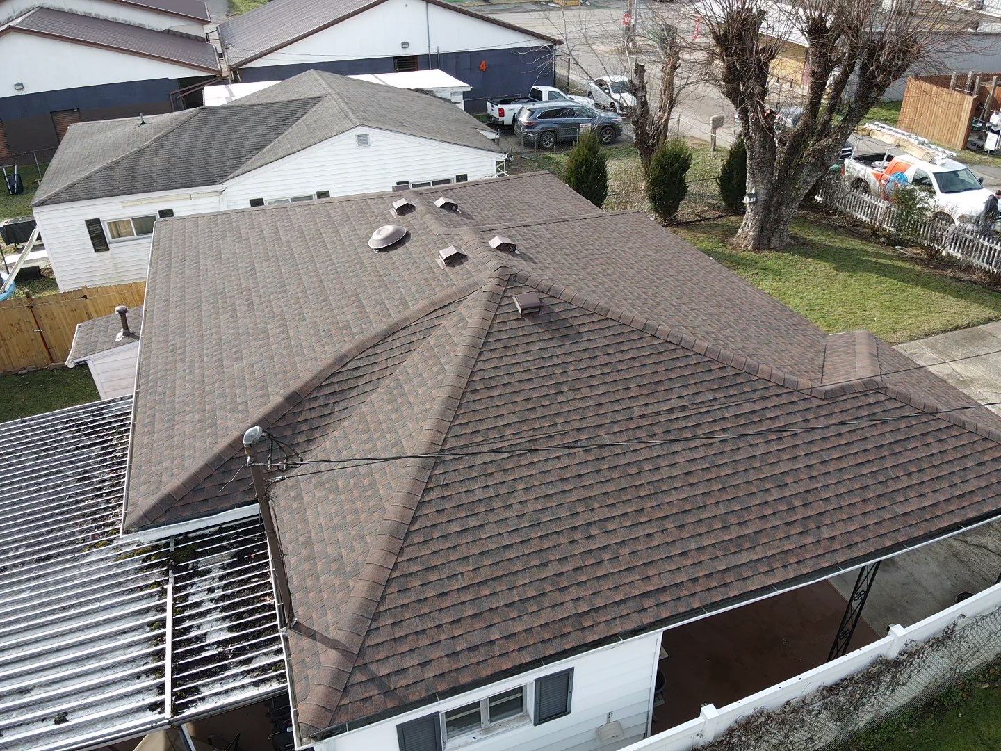 Residential Roofing Installation using GAF TImberline HDZ Hickory by Rainstoppers Roofing