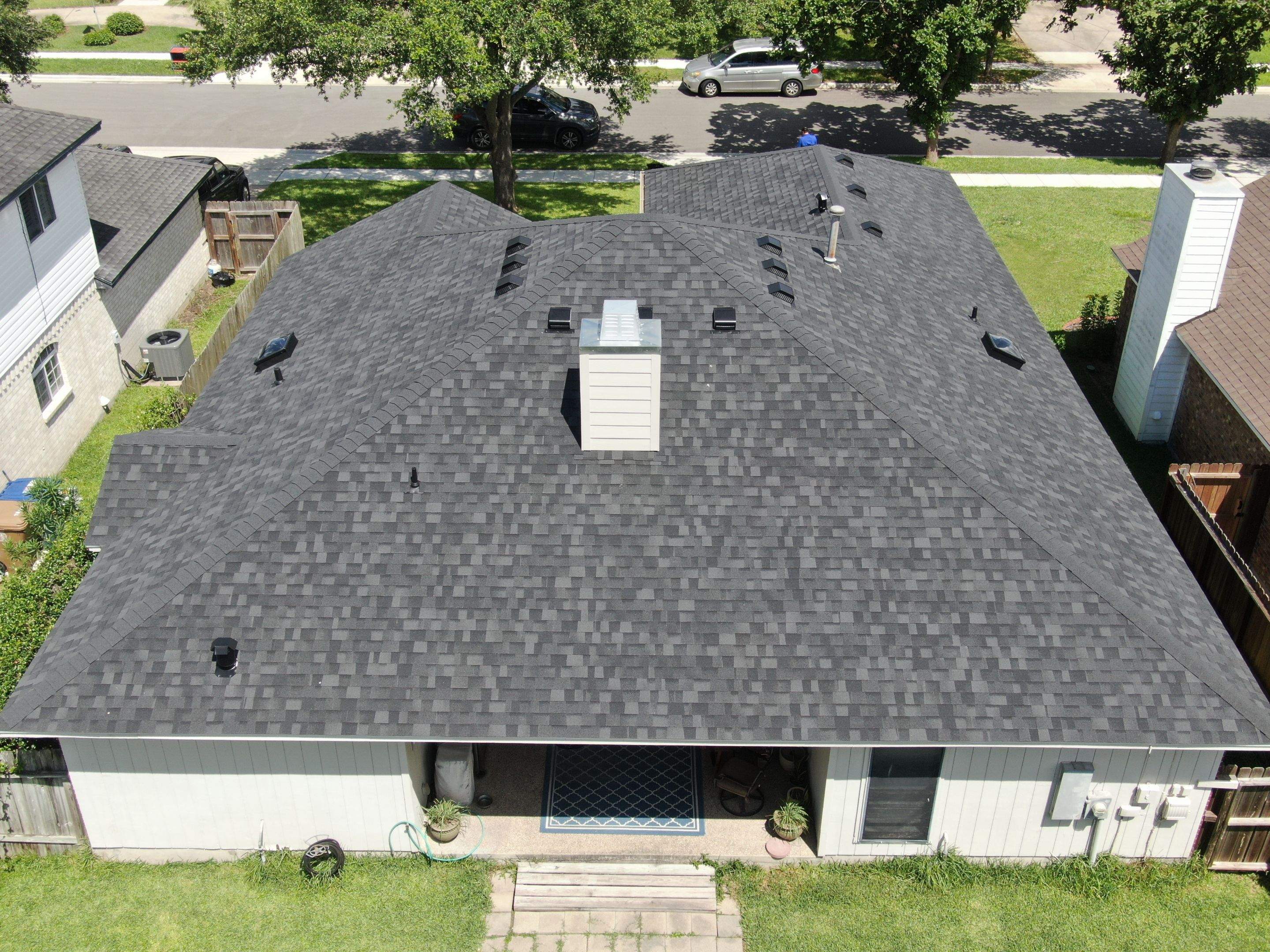 Nothing looks nicer than a little black roof by Bayfront Roofing and Construction