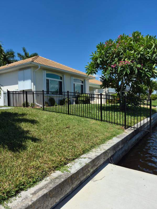 Custom Black Aluminum Fence Enclosure for Punta Gorda Waterfront Property by True Fence LLC
