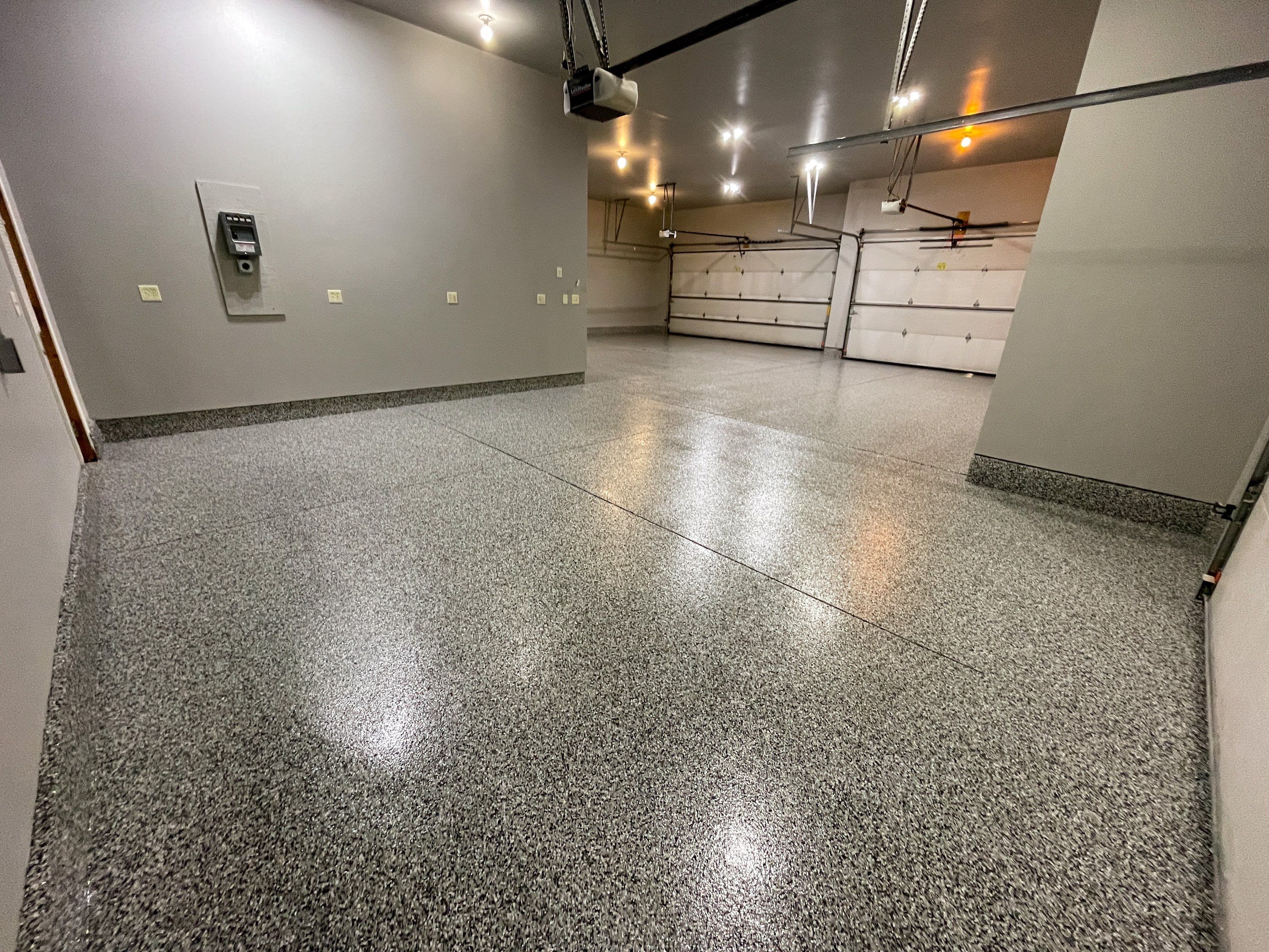 Garage using Domino  by Select Painting, Coatings & Garage Cabinets