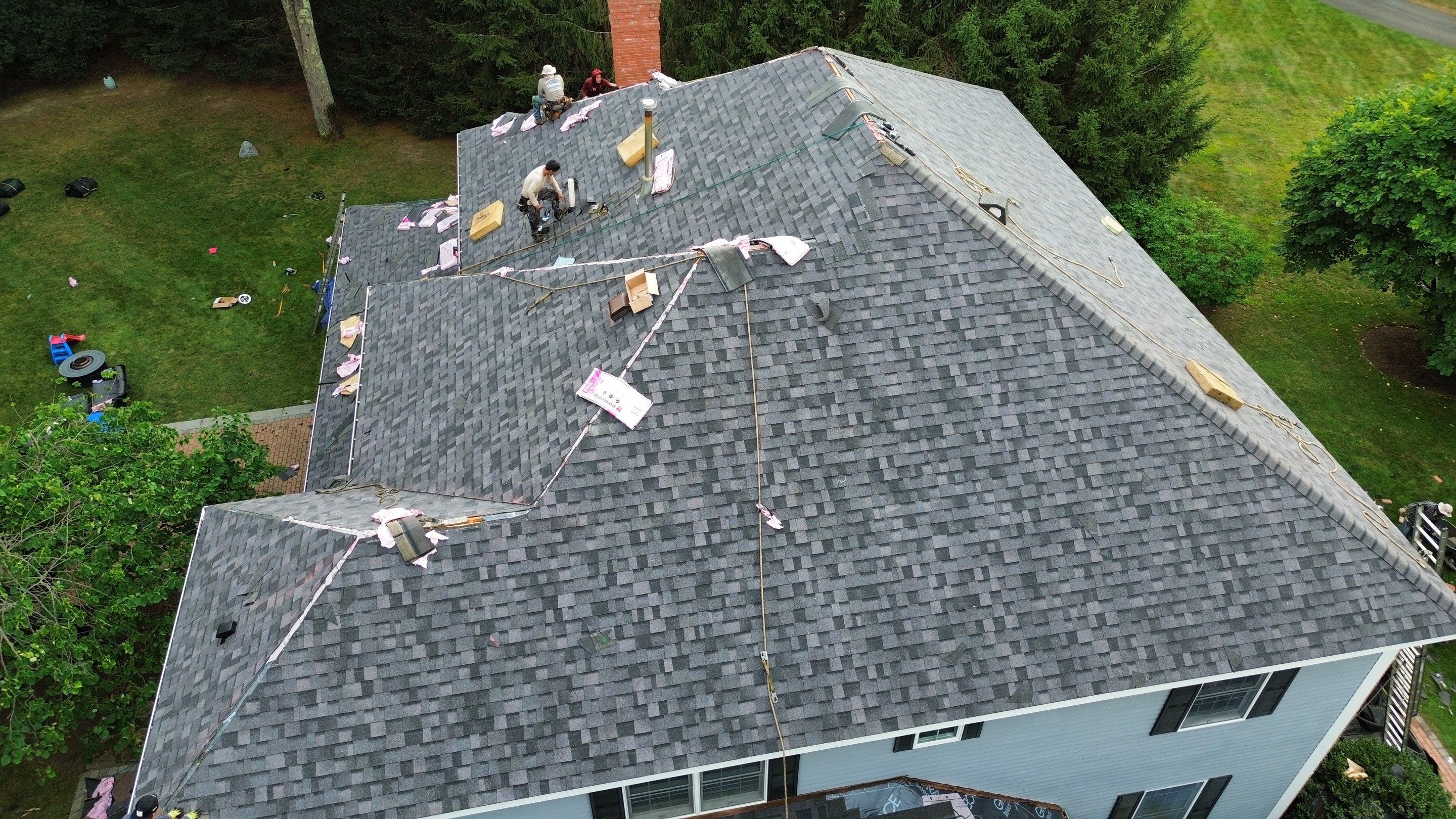 Roof Replacement & Gutter System Upgrade in Westford, MA by Mighty Dog Roofing of Greater Middlesex County