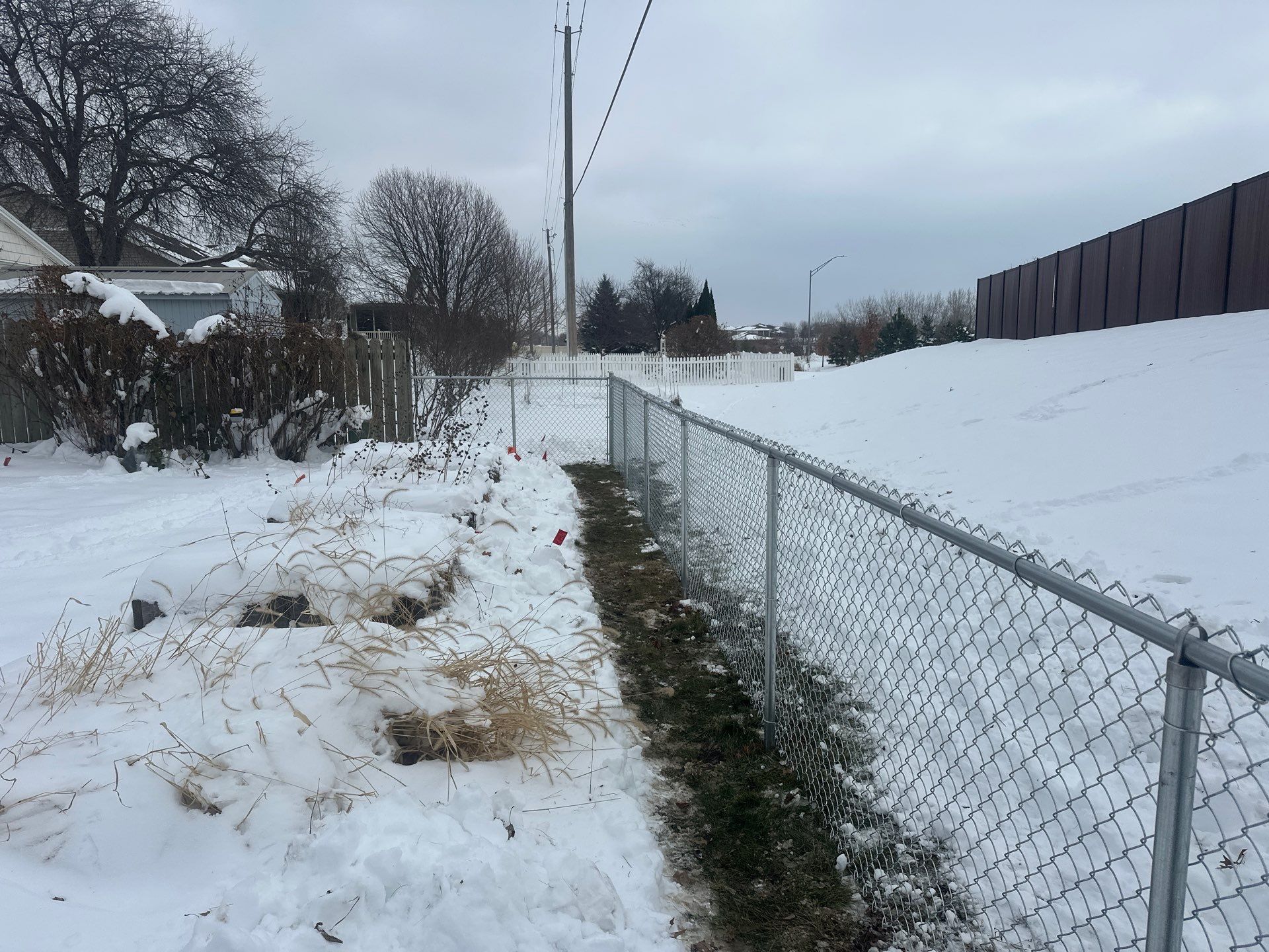 Galvanized Chain Link Fence Installation in Cedar Falls IA by Perfect Picket Fence and Stain