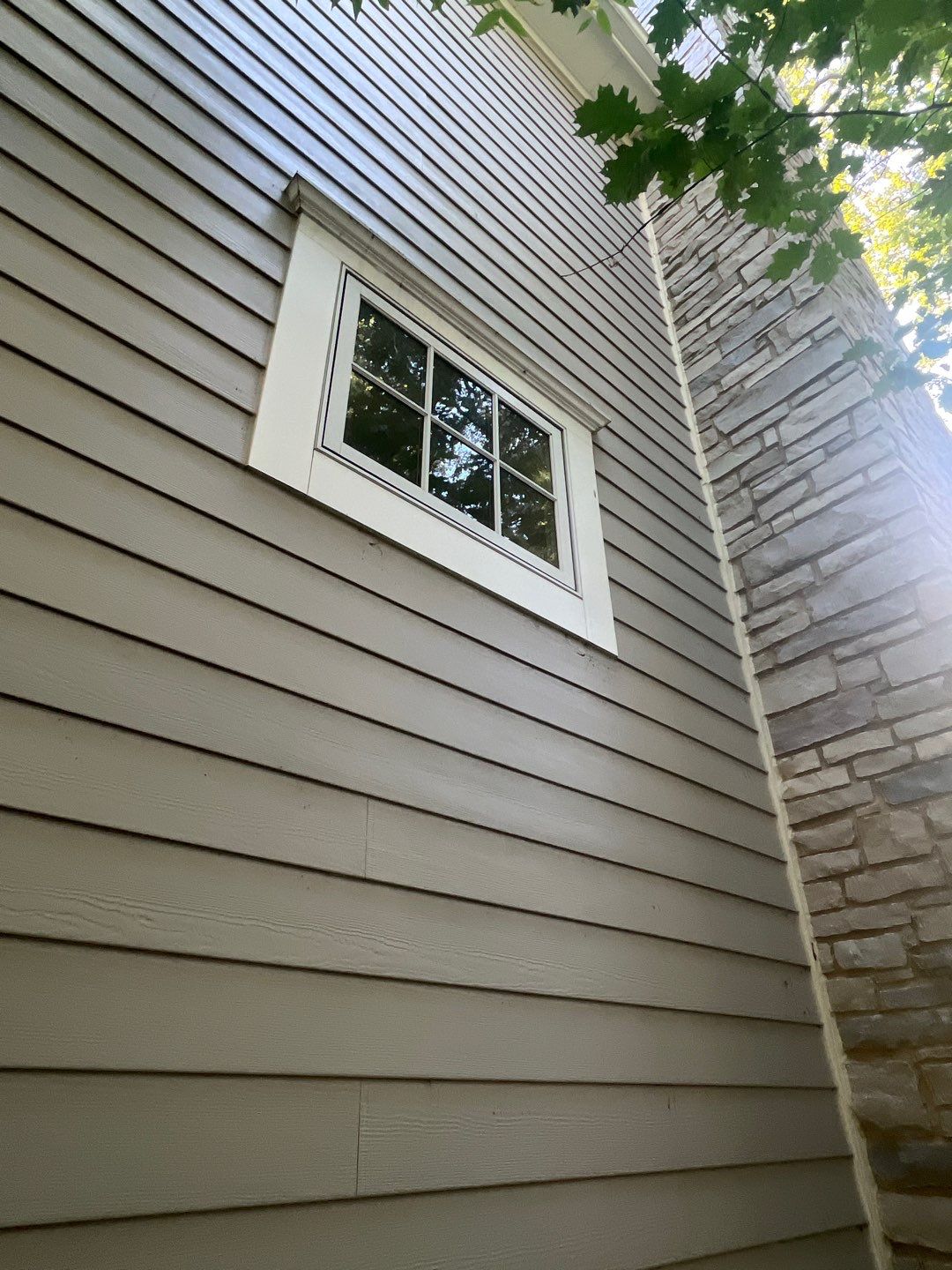 Hardie Board House & Detached Garage Soft Washing by Northern Power Washing LLC.