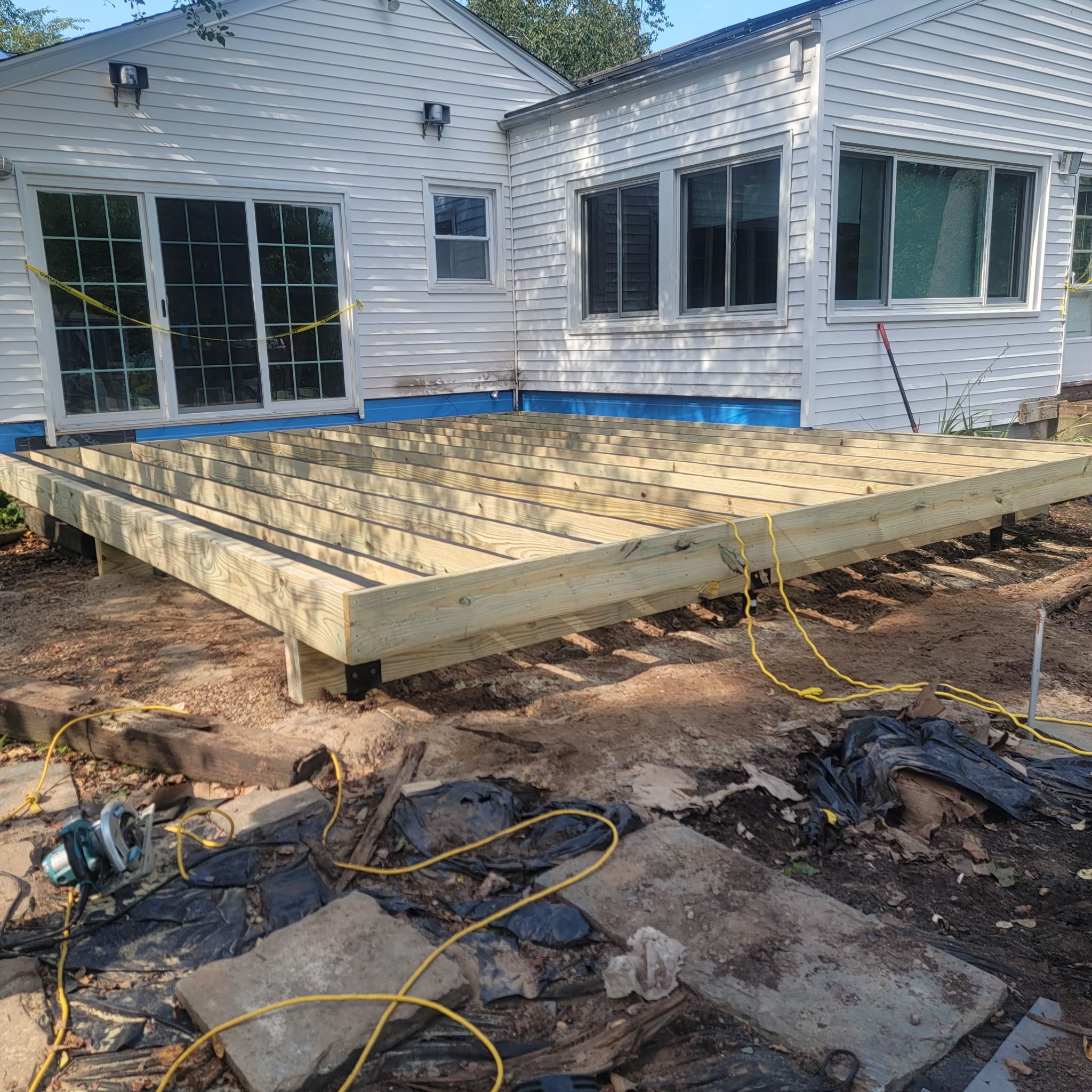 Deck and Ramp replacement using Trex Select Millstone, Trex transcend White Railings  by DiGiorgi Roofing and Siding Inc