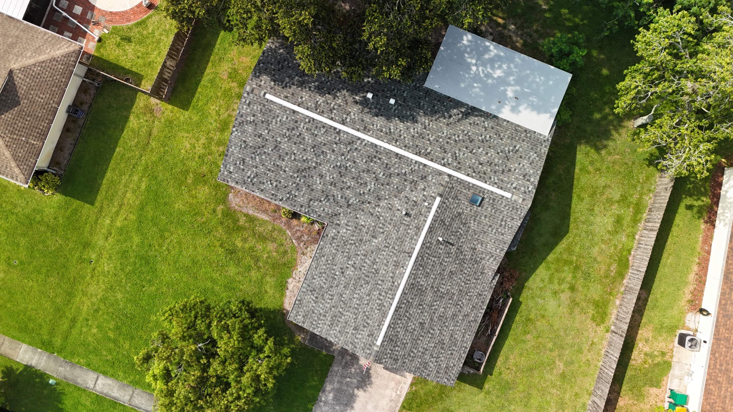 Melbourne Home Roof Replacement with Tamko Titan Thunderstorm Gray Shingles by Wiedmann Construction & Roofing