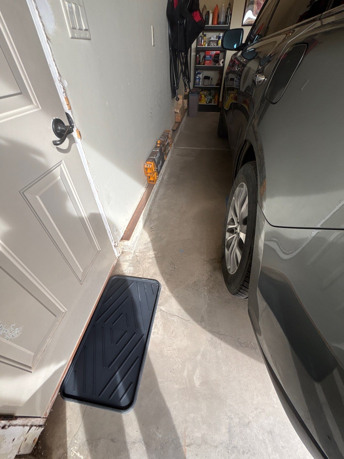 Sioux Falls Garage Floor Repair and Speckled Epoxy Coating Installation by Select Painting, Coatings & Garage Cabinets