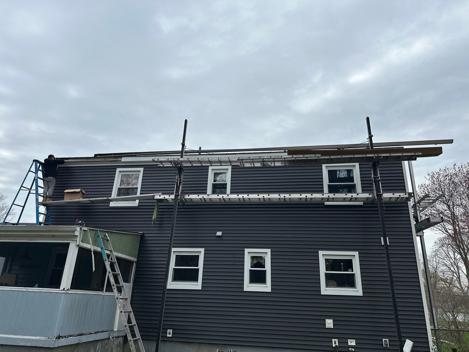 Siding Installation using Royal Building Products Carbon by A Plus Exterior