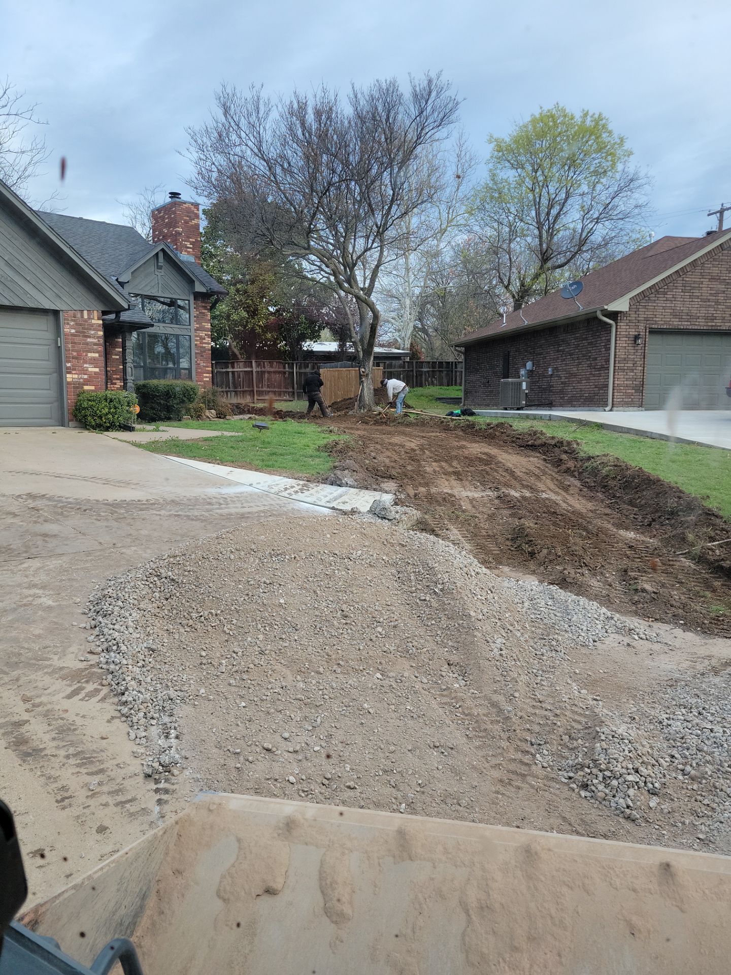 Concrete Driveway and Fence by Clays Services Inc