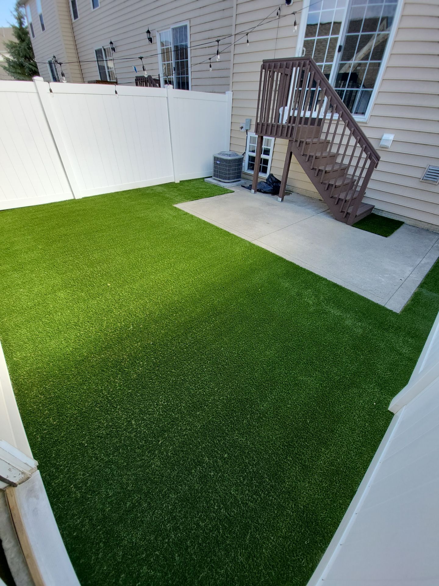 Small Private Lawn by Southwest Greens Midwest