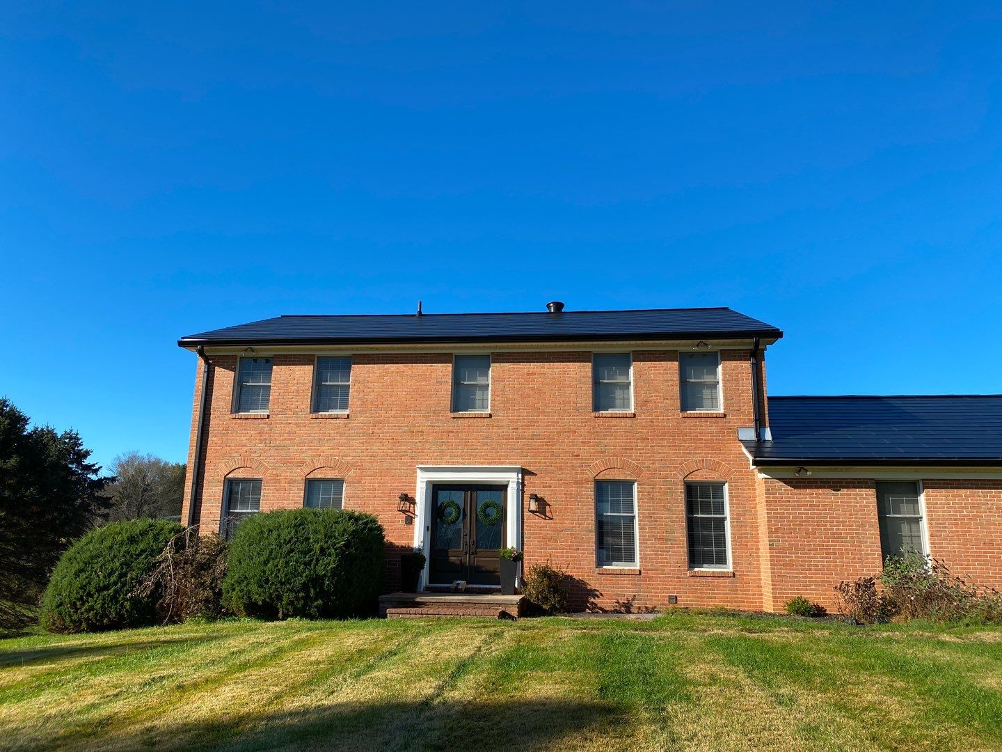 Tesla Solar Roof by American Home Contractors