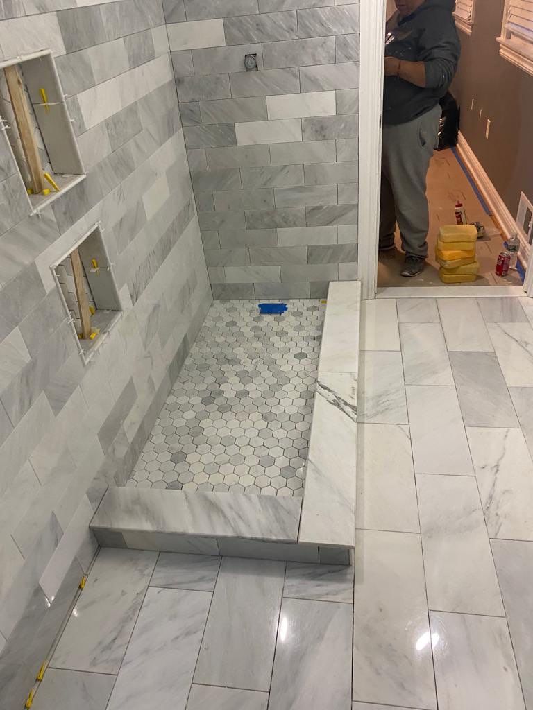Bathroom Remodel using Tile by Home Concepts Construction